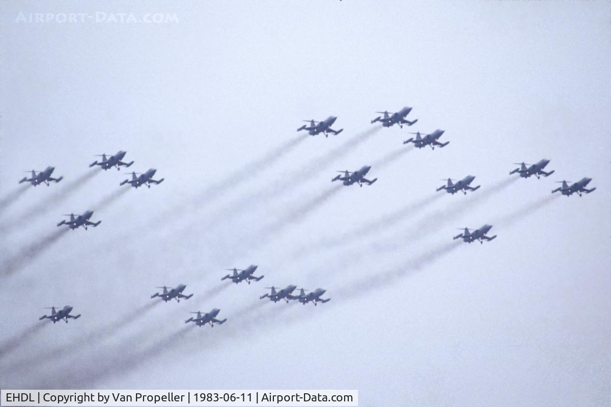 Deelen Airbase Airport, Deelen Netherlands (EHDL) - Minor solar eclipse: flypast of 18 F-104G Starfighters of the Royal Netherlands Air Force at Deelen Air Base 1983 Open Day