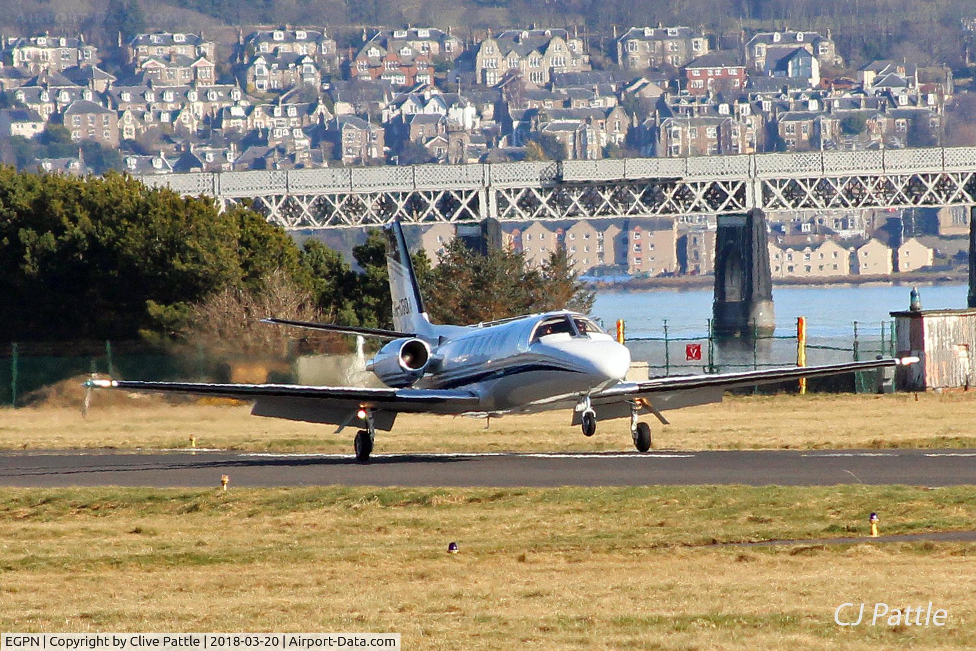 Dundee Airport, Dundee, Scotland United Kingdom (EGPN) - Threshold touchdown at Dundee - With the Tay Rail Bridge in the background.