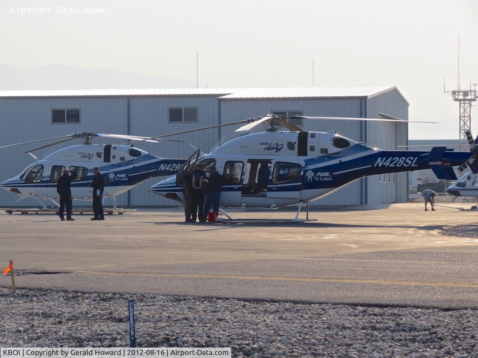 Boise Air Terminal/gowen Fld Airport (BOI) - Two St Luke's life flight helicopters parked on the Idaho Helicopter ramp.