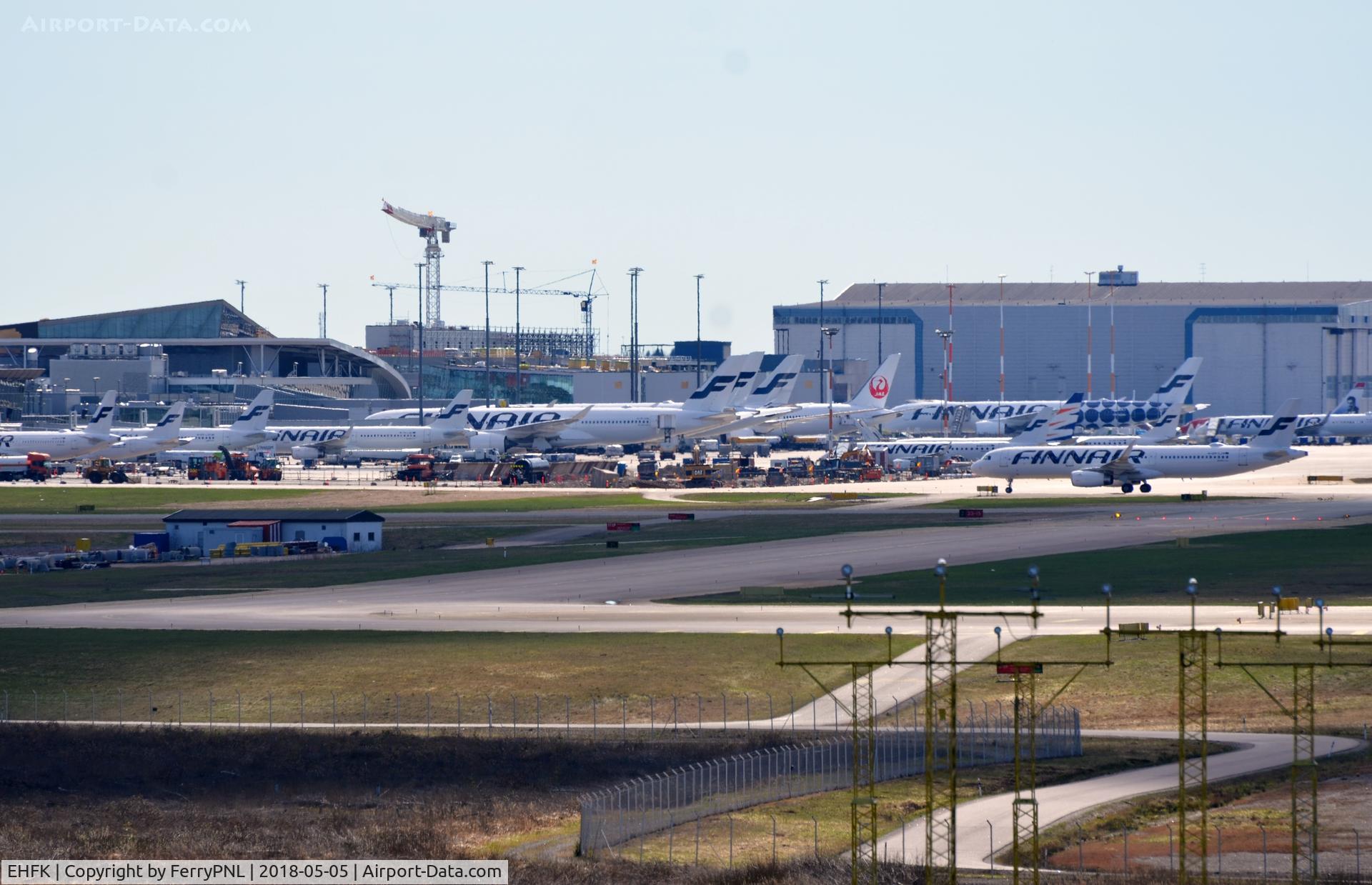 EHFK Airport - Hesinki fills up during afternoon rush hour. Seen from runway 22L .