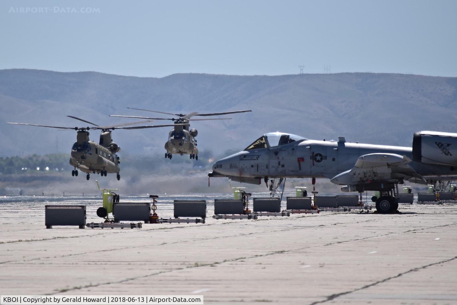 Boise Air Terminal/gowen Fld Airport (BOI) - Two CH-47F helicopters from the Washington Army national Guard taking off from Taxiway B.