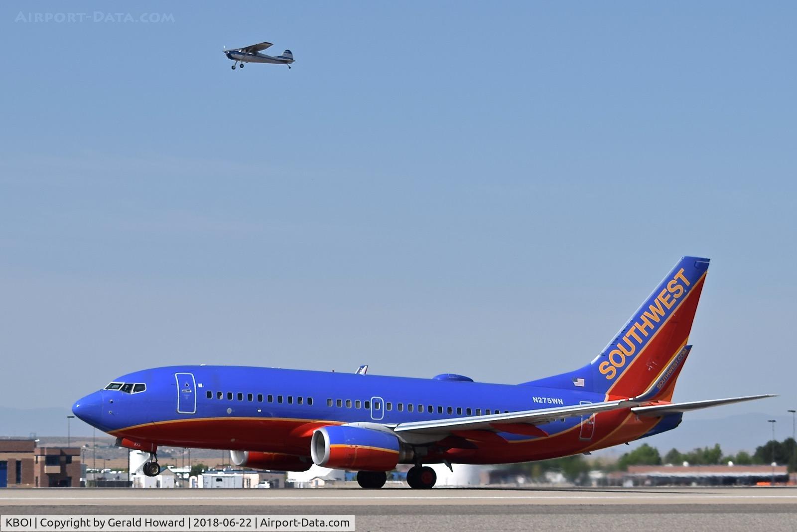 Boise Air Terminal/gowen Fld Airport (BOI) - The Cessna took off a few seconds earlier from 10R, but the Southwest jet on 10L caught up pretty fast.
