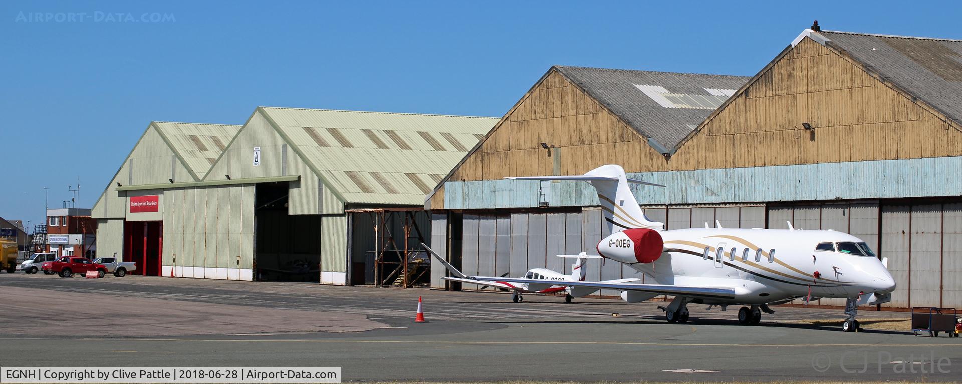 Blackpool International Airport, Blackpool, England United Kingdom (EGNH) - Apron view, showing WWII era hangarage, at Blackpool