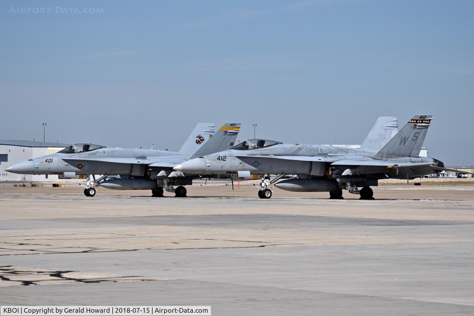 Boise Air Terminal/gowen Fld Airport (BOI) - Two F/A-18C parked on the south GA ramp.VMFA-323 “Death Rattlers”, 3rd MAW, MAG-11, MCAS Miramar, CA.
