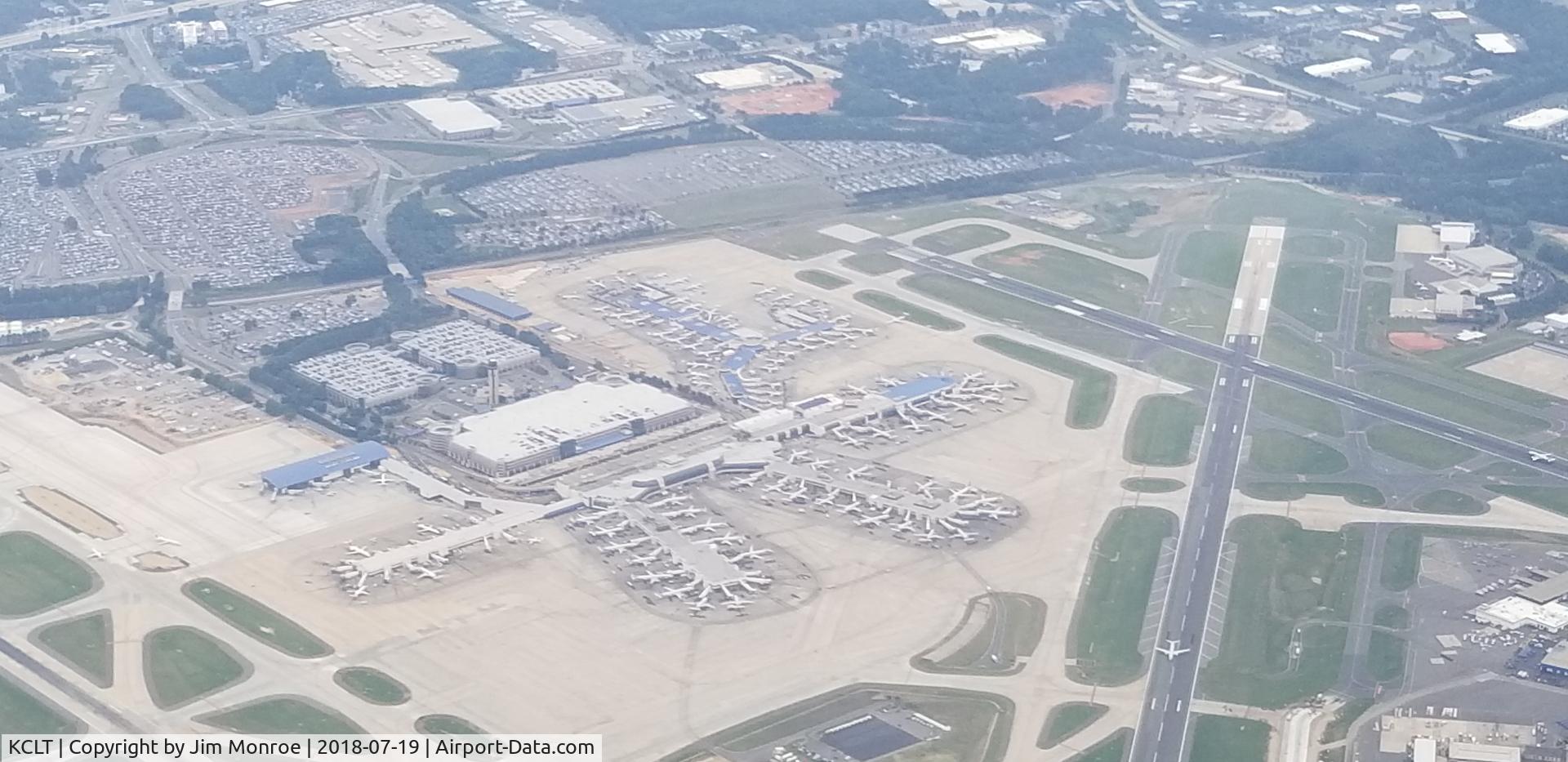Charlotte/douglas International Airport (CLT) - Taken just before 11AM on a Thursday. Anyone see an empty gate? Taken from 3,000 feet on an Angel Flight from KCCO to KJQF