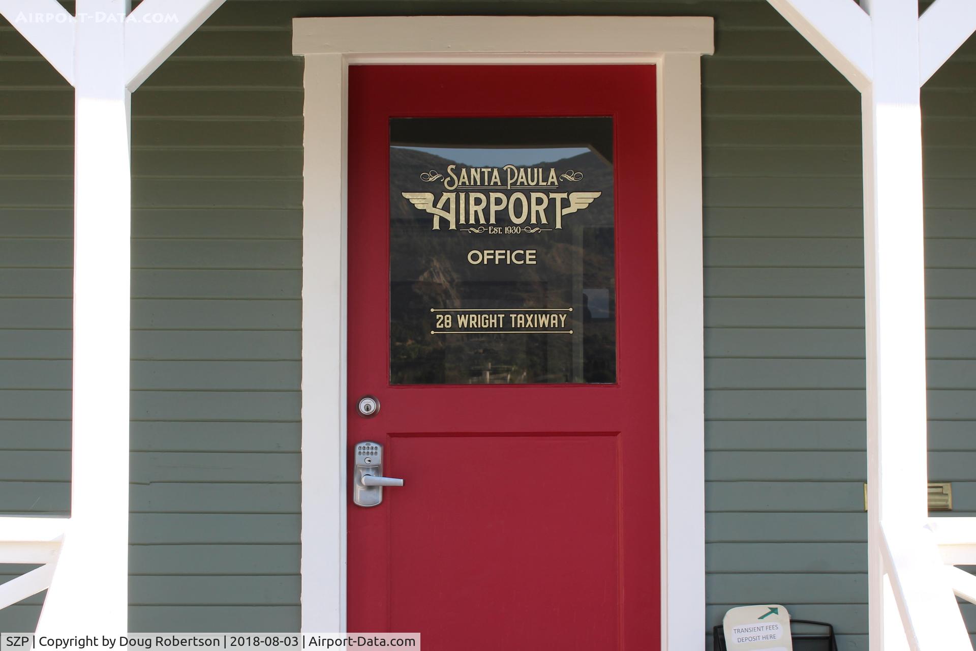 Santa Paula Airport (SZP) - Very classy information on SZP's Remodeled Airport Office front door.