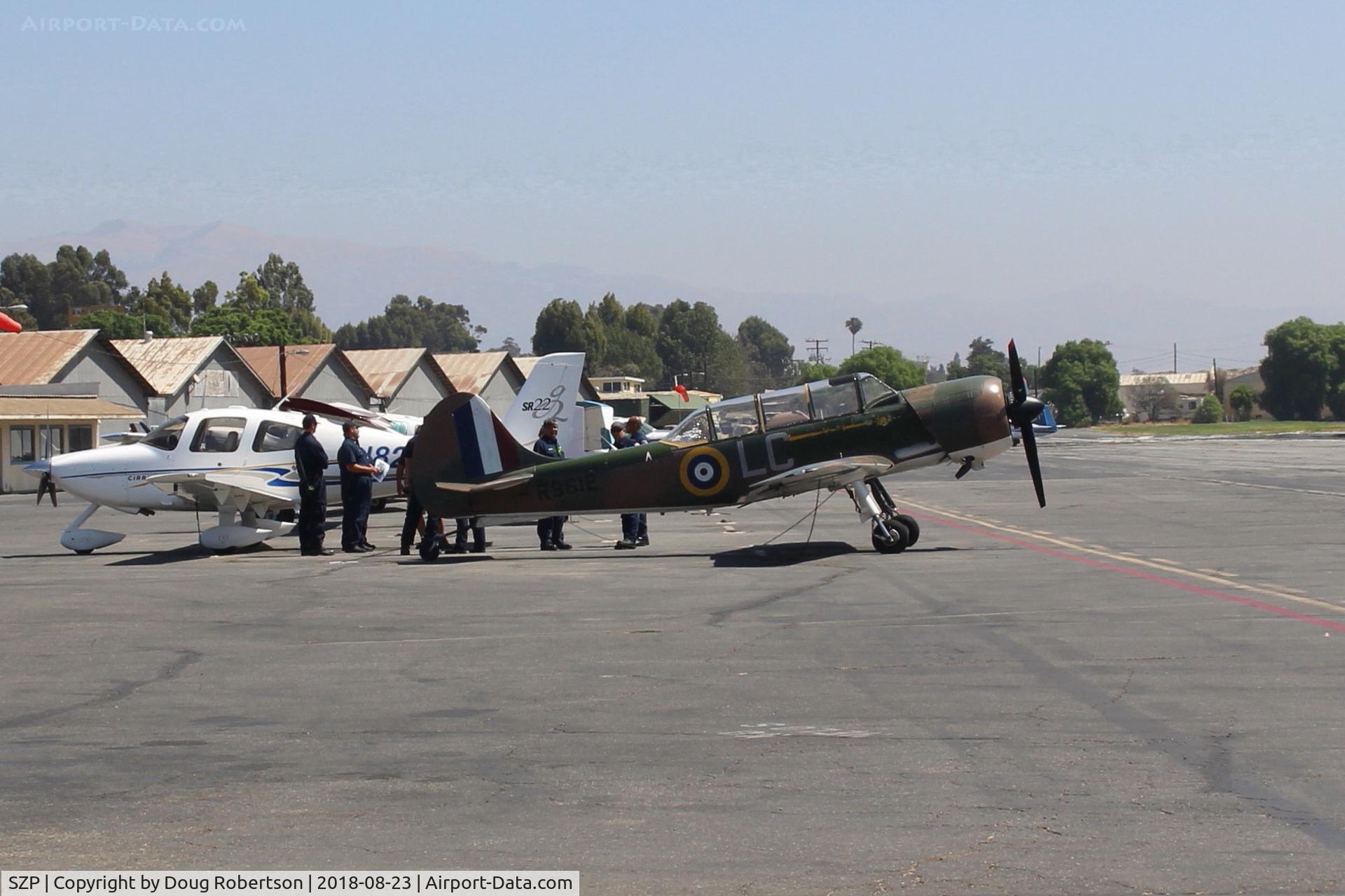 Santa Paula Airport (SZP) - Santa Paula Fire Department Firemen undergoing in-service training at the SZP Transient Ramp next to the Yak 52.