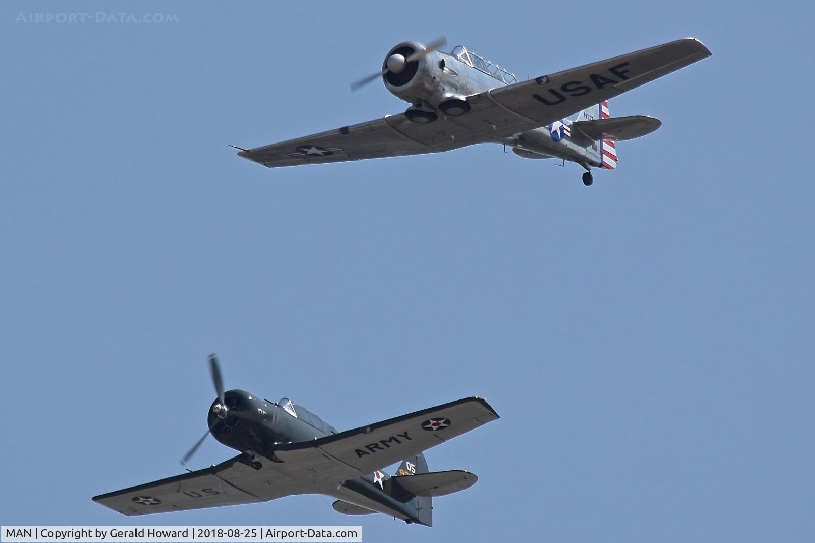 Nampa Municipal Airport (MAN) - WW II aircraft fly by.