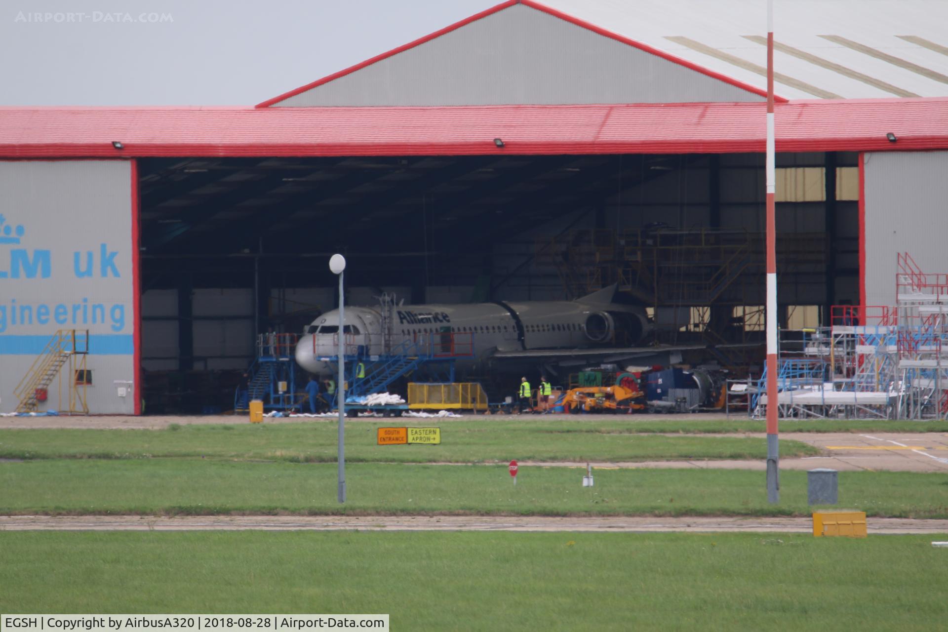 Norwich International Airport, Norwich, England United Kingdom (EGSH) - Alliance Fokker 100 VH-XWO undergoing maintenance with KLM Engineering at Norwich