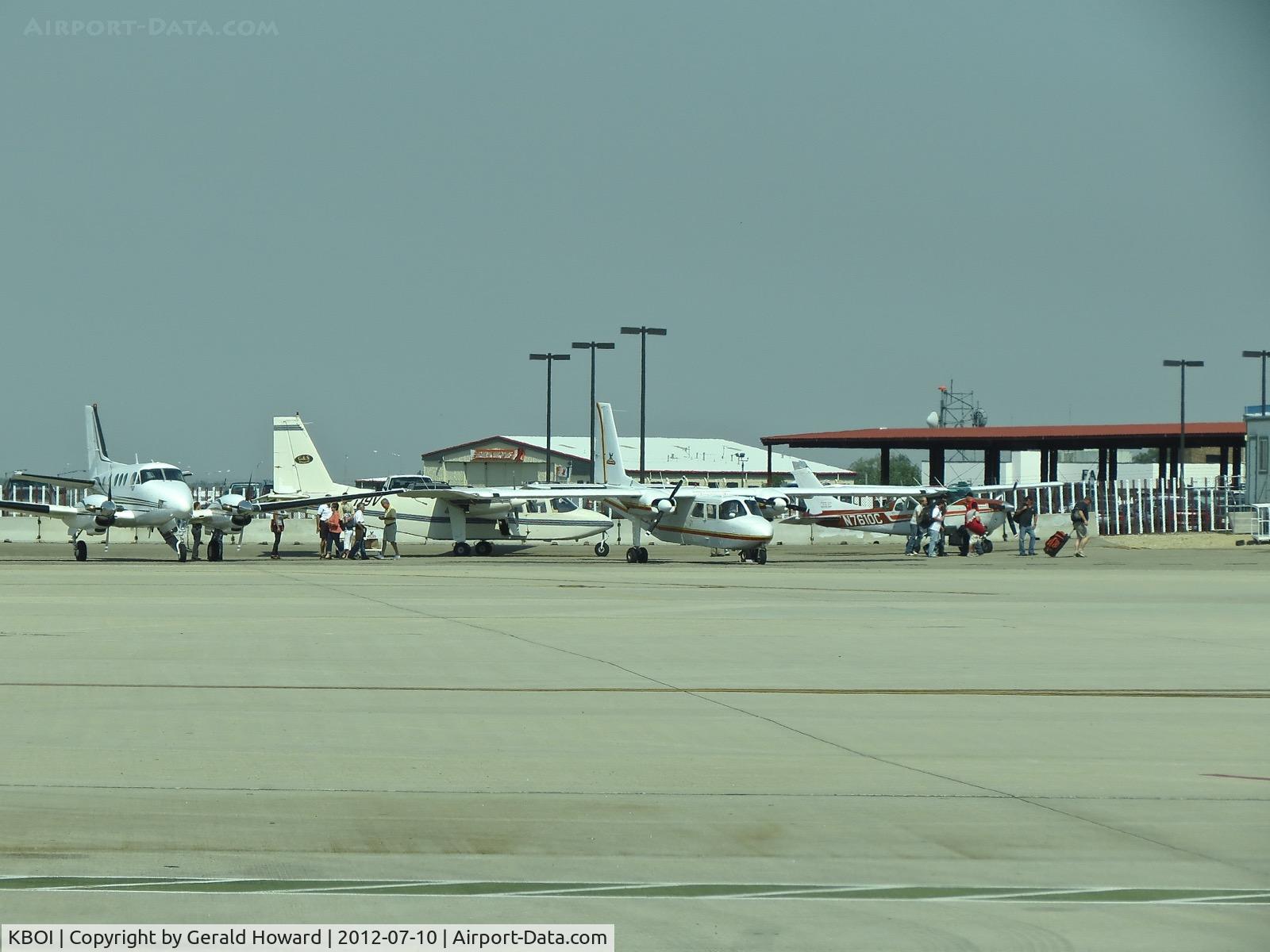 Boise Air Terminal/gowen Fld Airport (BOI) - Passengers returning from vacations in the mountains on the back country ramp.