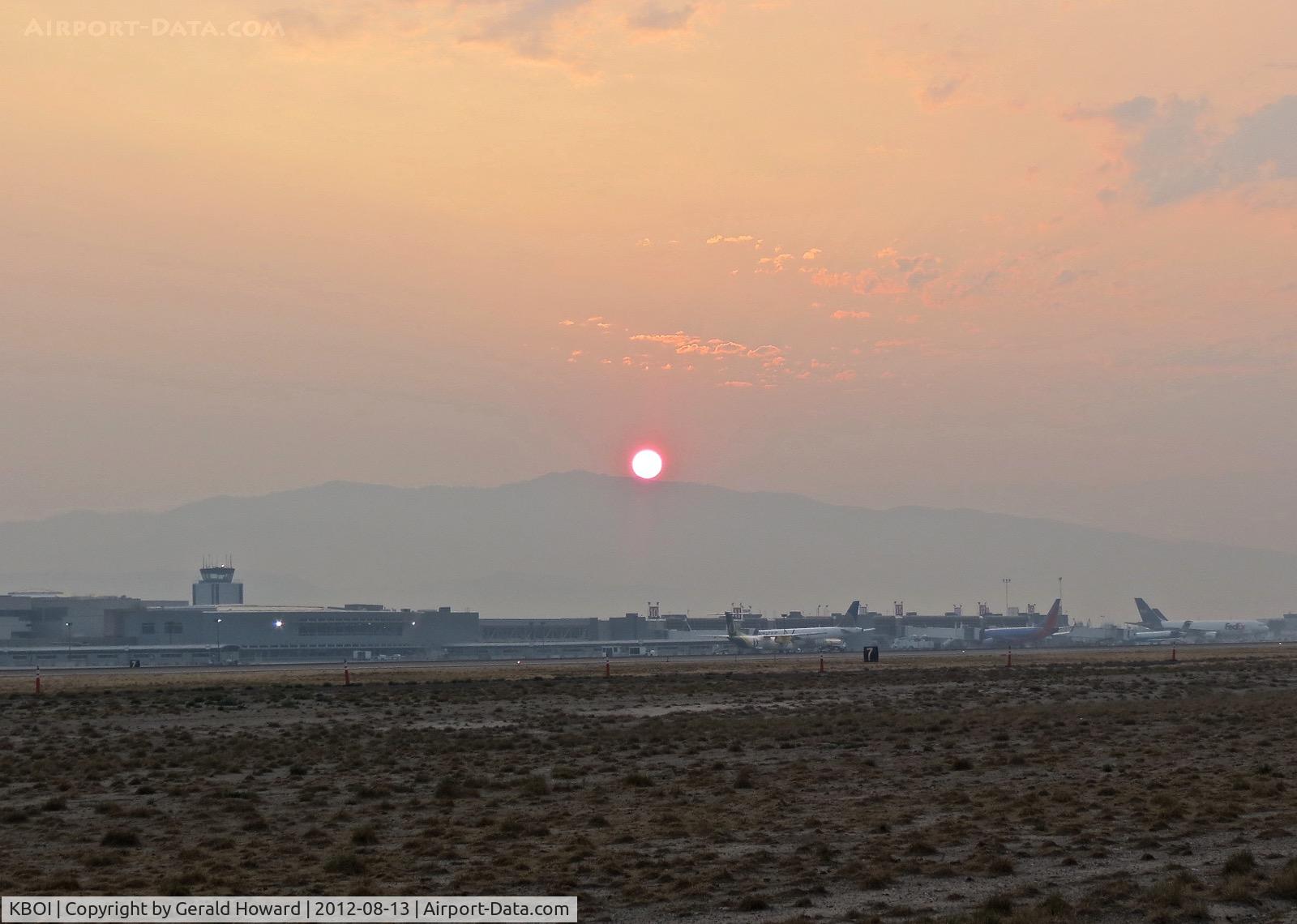 Boise Air Terminal/gowen Fld Airport (BOI) - Sunrise during the fire season. Visibility could be from 6 to 2 miles during August.