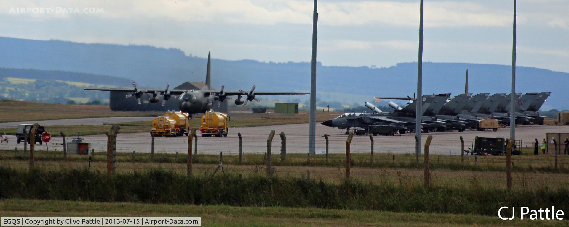 RAF Lossiemouth Airport, Lossiemouth, Scotland United Kingdom (EGQS) - Apron view at RAF Lossiemouth - taken during a TLT (Tactical Leadship Training) Course - hence a variety of visiting aircraft.