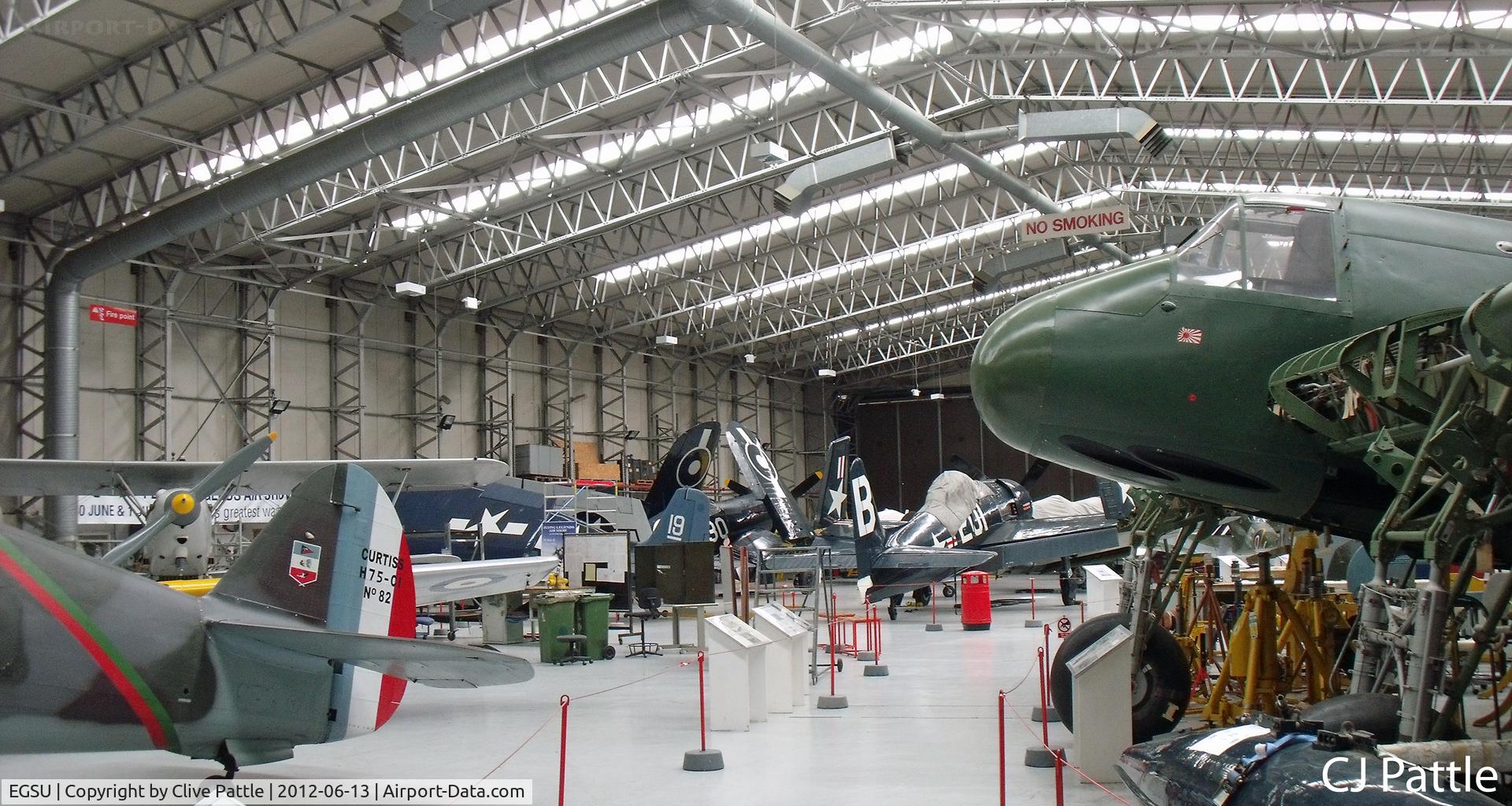 Duxford Airport, Cambridge, England United Kingdom (EGSU) - View inside The Fighter Collection hangar at IWM Duxford