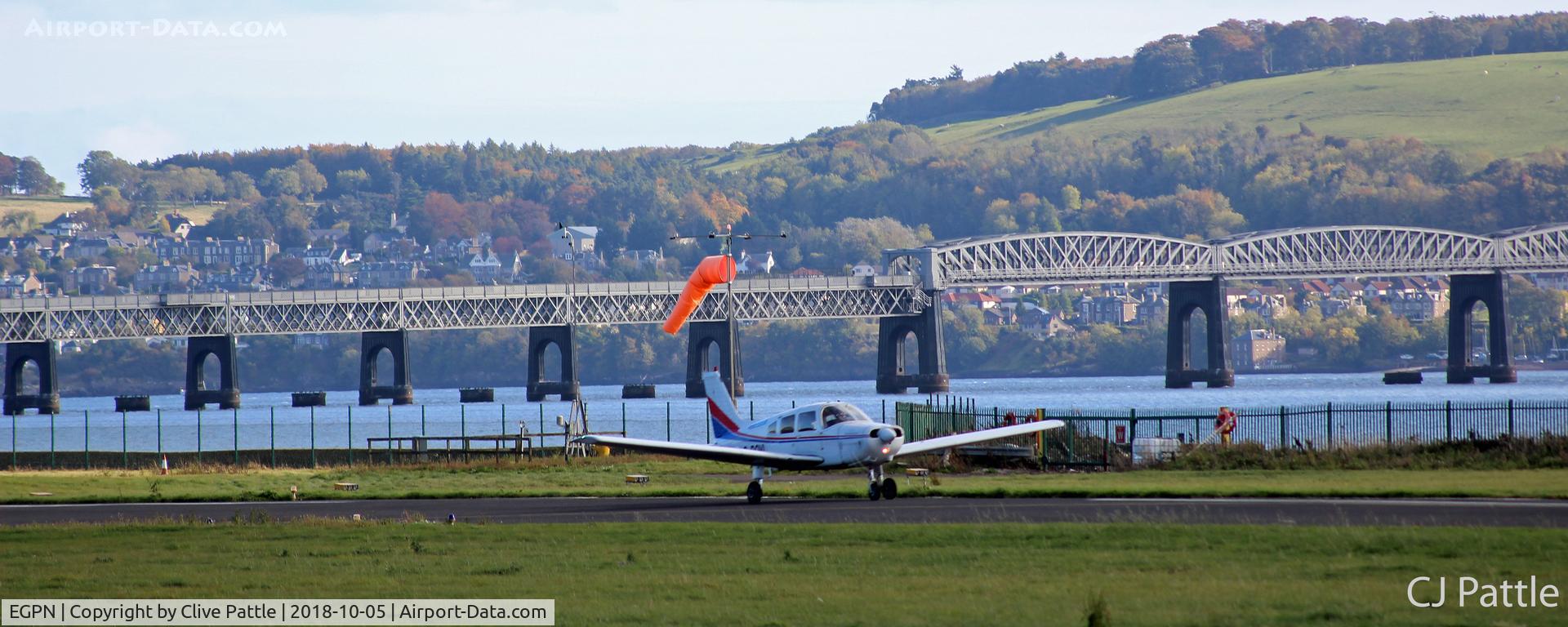 Dundee Airport, Dundee, Scotland United Kingdom (EGPN) - Facing south-east at Dundee with the Tay Rail Bridge in the background.