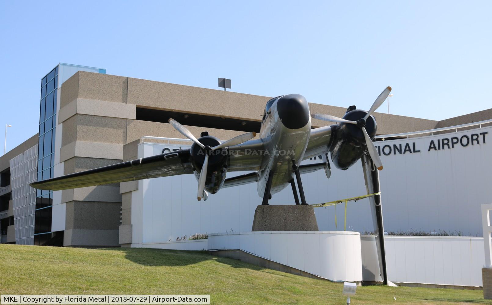 General Mitchell International Airport (MKE) - B-25 damaged by a thunderstorm prior to this shot