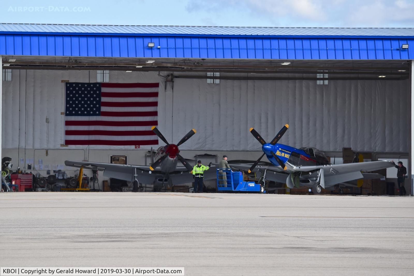 Boise Air Terminal/gowen Fld Airport (BOI) - Two Mustangs owned by Mustang High Flight LLC, Boise, Idaho seeing daylight after a long winter in the hangar.