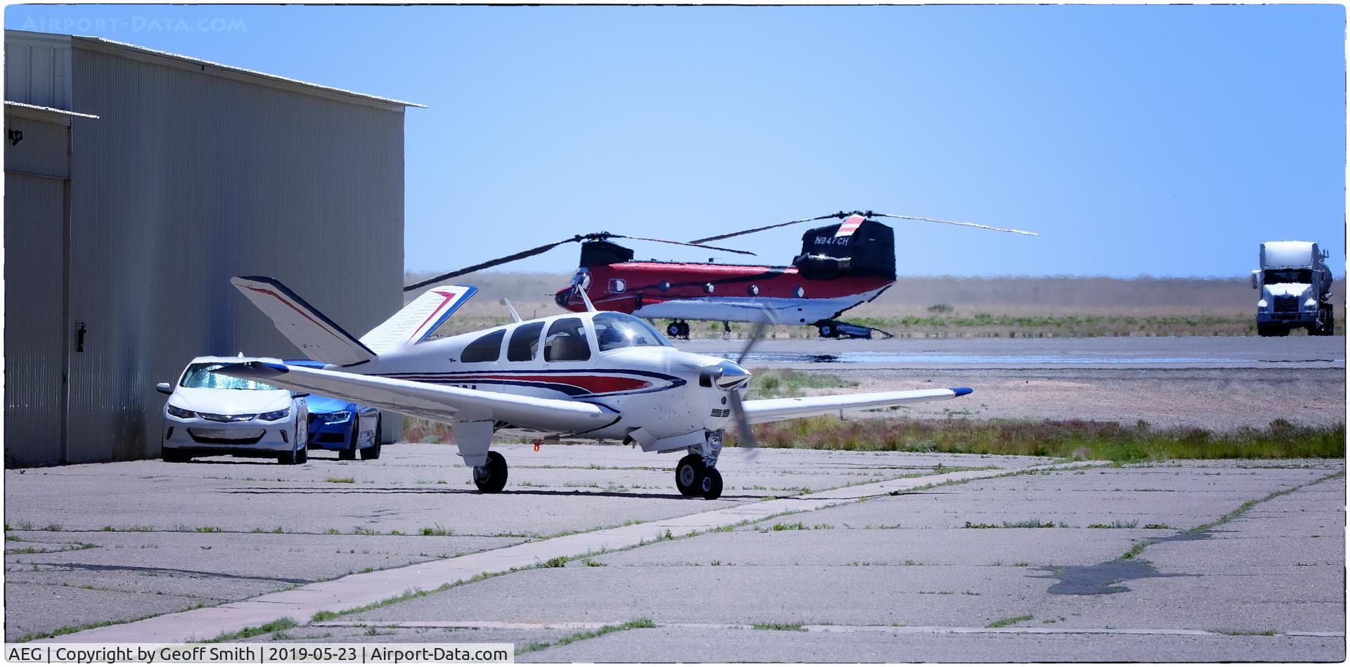 Double Eagle Ii Airport (AEG) - Bonanza warmup on AEG ramp.