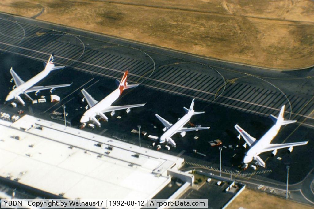Brisbane International Airport, Brisbane, Queensland Australia (YBBN) - APOV of 'Old Eagle Farm' International Airport YBBN on 12Aug1992. The line-up on the ramp (from front right to left) is a JAL Super Resort Express B747-246B, an Air New Zealand B767, a Qantas B747-338, and a British Airways B747-436.
