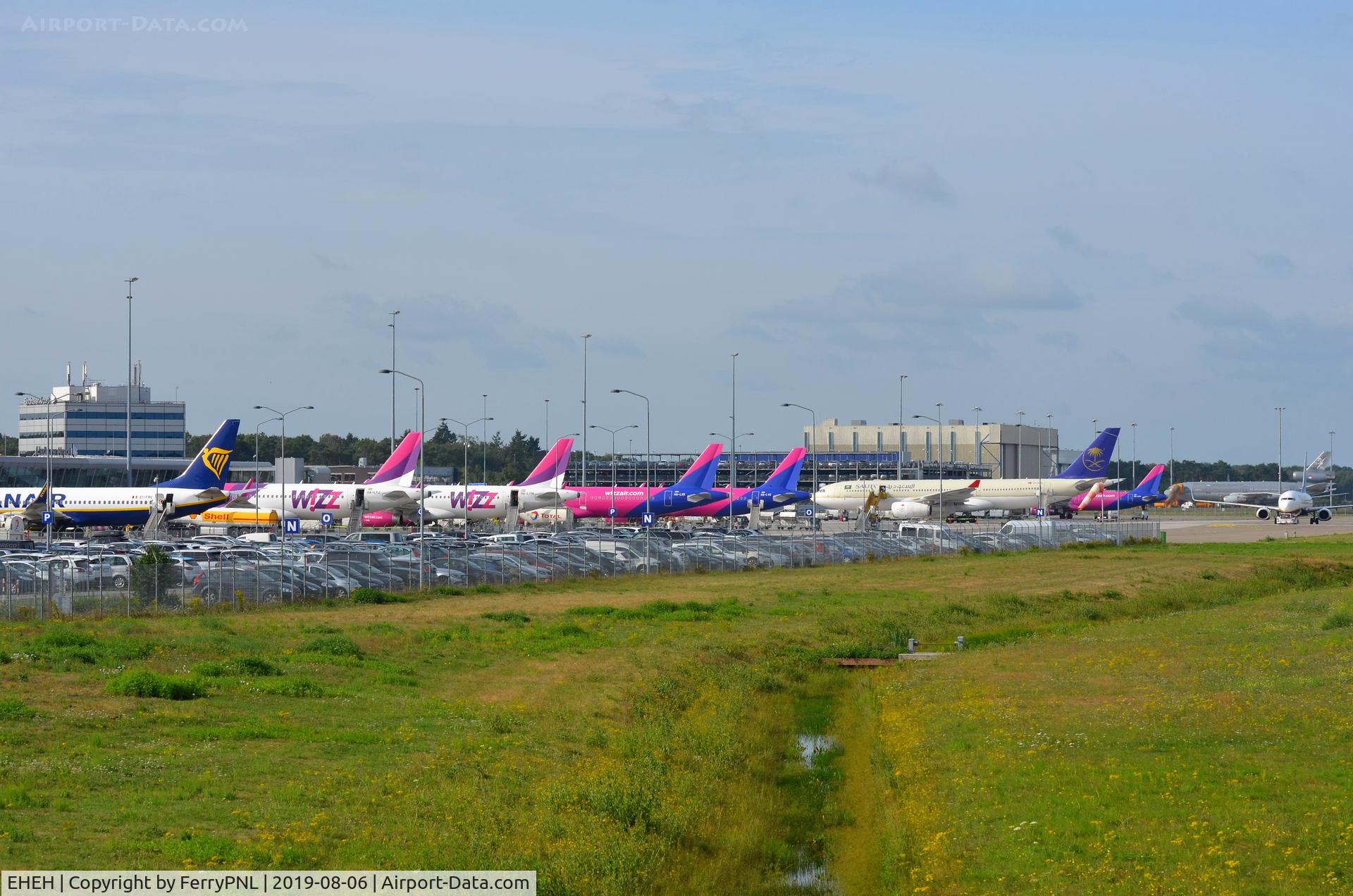 Eindhoven Airport, Eindhoven Netherlands (EHEH) - Morning rush hour with 5 Wizz, 4 (2 not in frame) Ryanair, a Saudi A332 and Dutch Air Force DC10