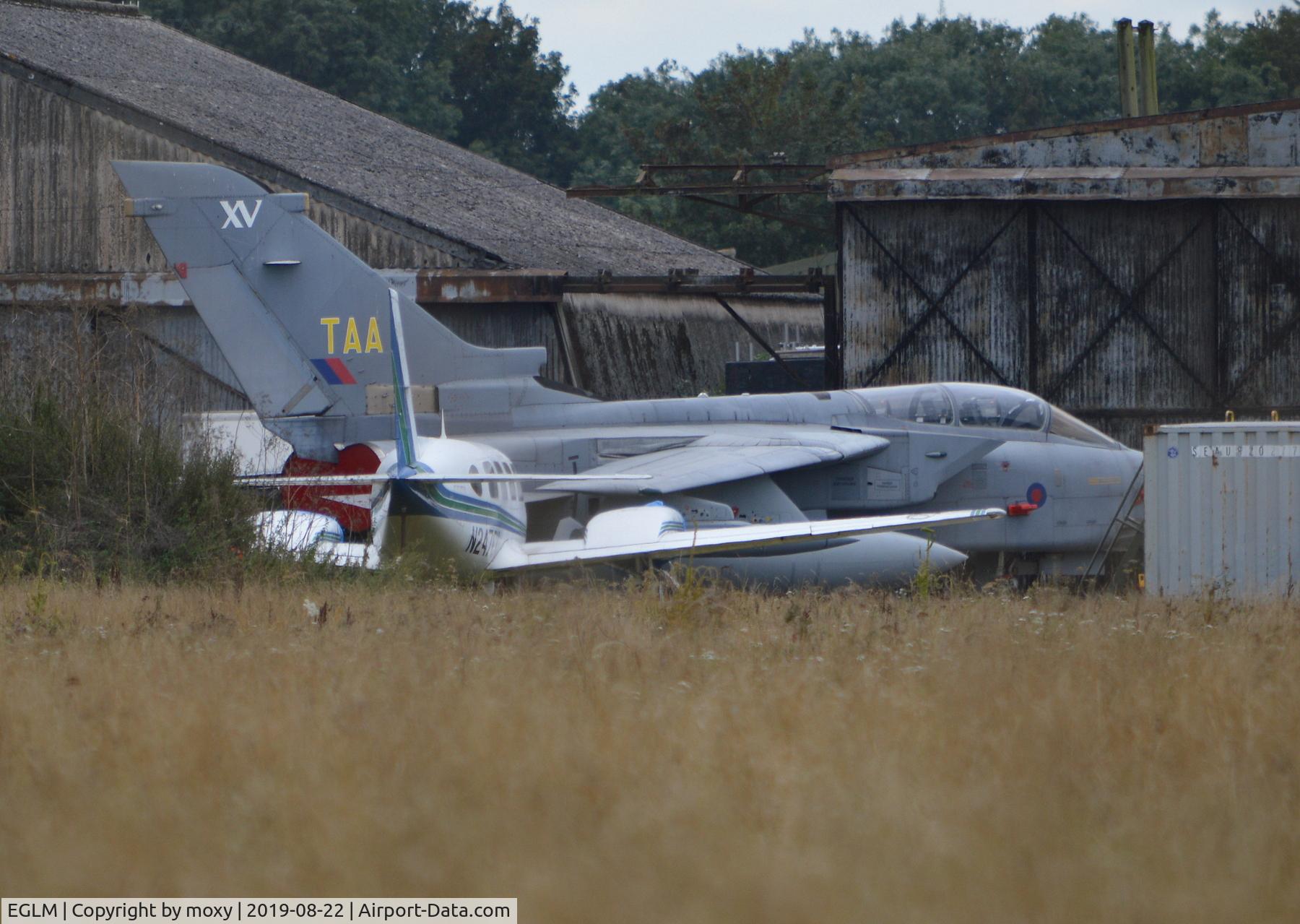 White Waltham Airfield Airport, White Waltham, England United Kingdom (EGLM) - Film company, Shoot Aviation at White Waltham have amongst other aircraft, Tornado GR.1 ZA355 and Piper Navajo G-BLFZ at present painted with spurious marks N247CK.