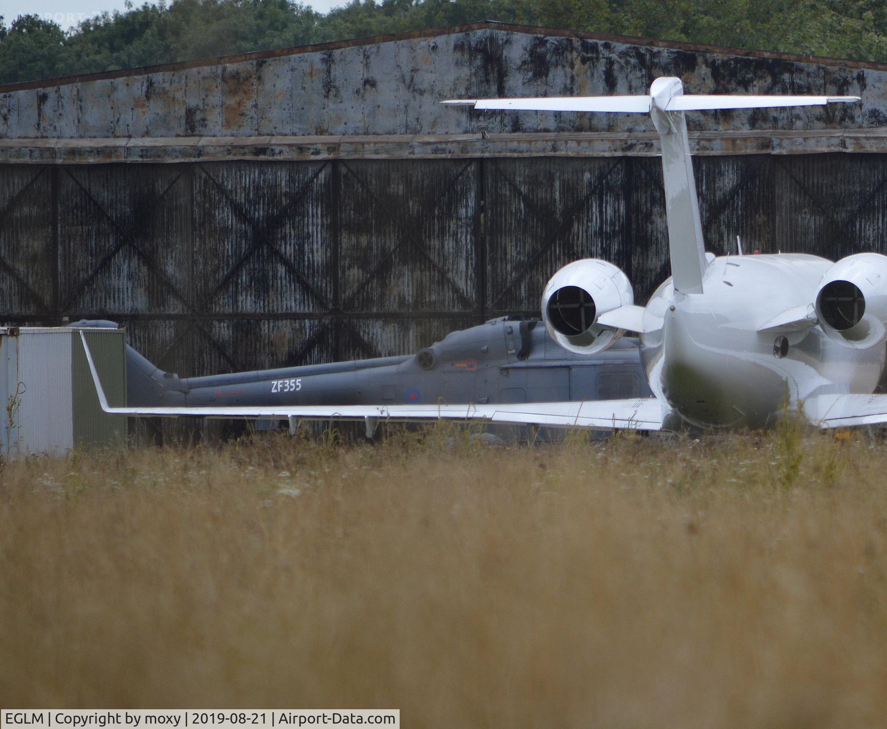 White Waltham Airfield Airport, White Waltham, England United Kingdom (EGLM) - Along with Challenger marked N247CK, film company, Shoot Aviation at White Waltham have amongst other aircraft, Westland Lynx XZ238 marked with spurious serial ZF355.