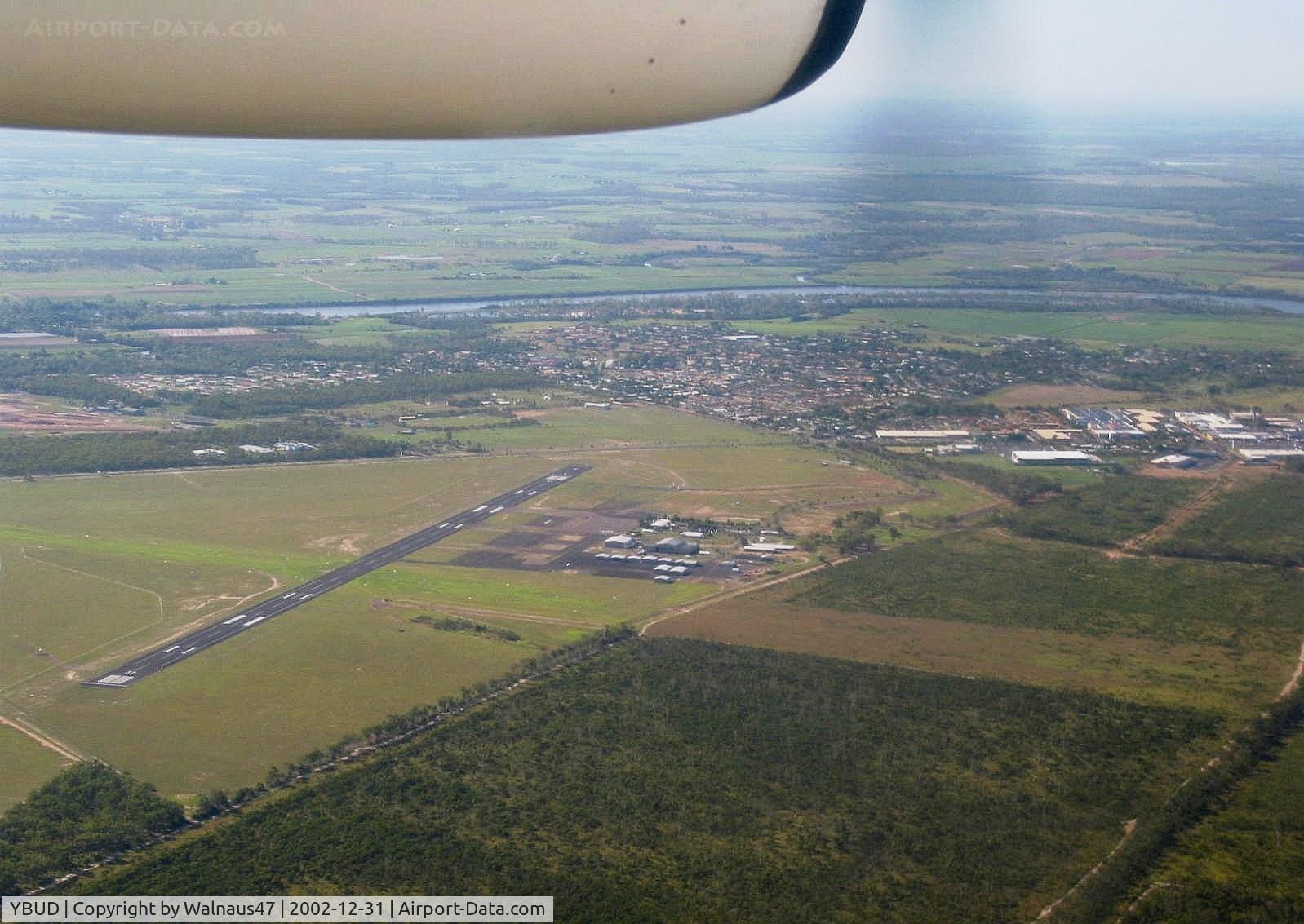 Bundaberg Airport, Bundaberg, Queensland Australia (YBUD) - Bundaberg Airport YBUD ‘Airport Overview’ as seen from Qantaslink DHC-8-102 Dash8 VH-TNW arriving from Brisbane YBBN on 31Dec2002. (‘Sugarland’ visible at right).