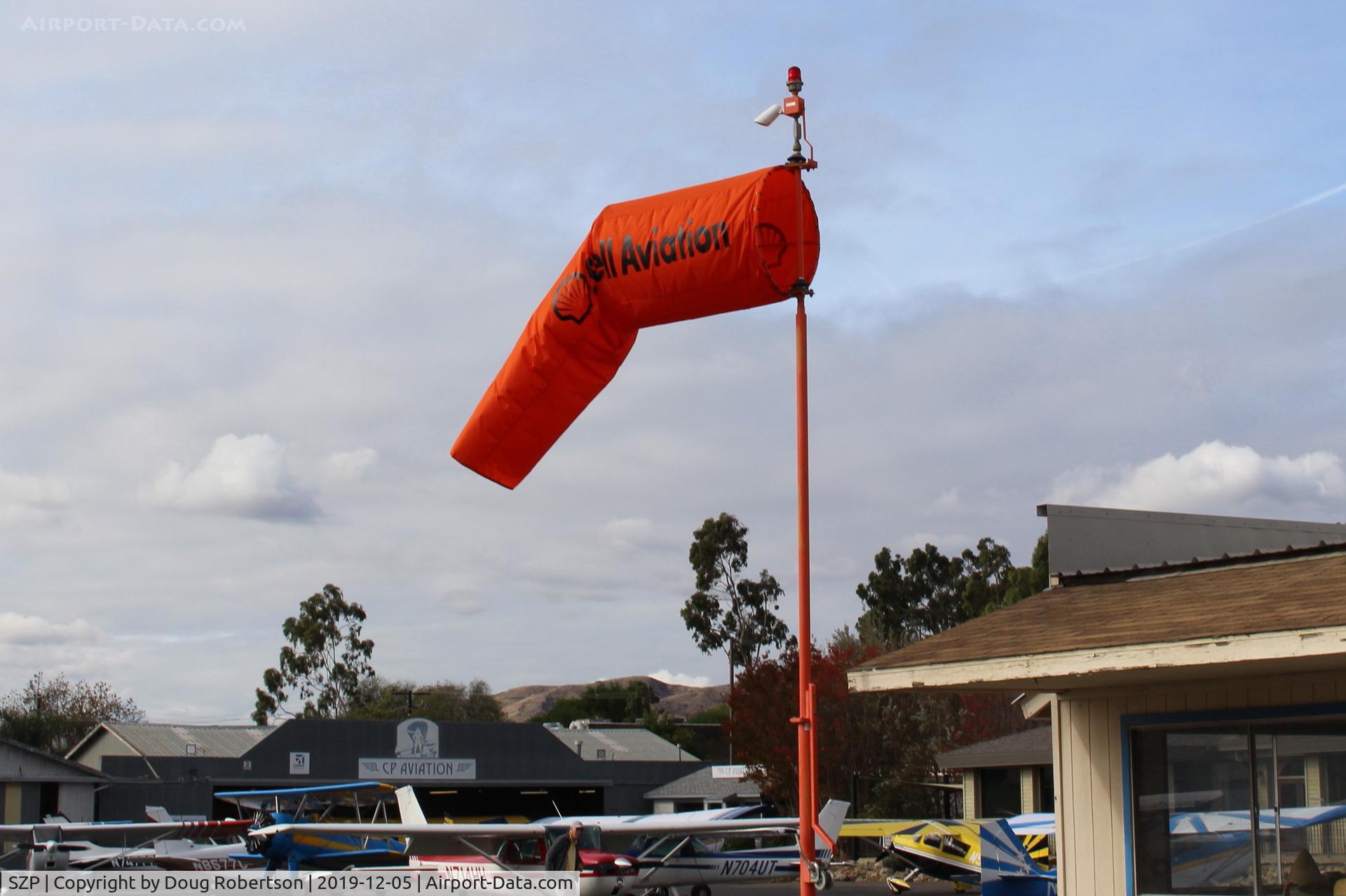 Santa Paula Airport (SZP) - Near midfield replaced windsock shows mild Santana winds favoring Rwy 04 usage