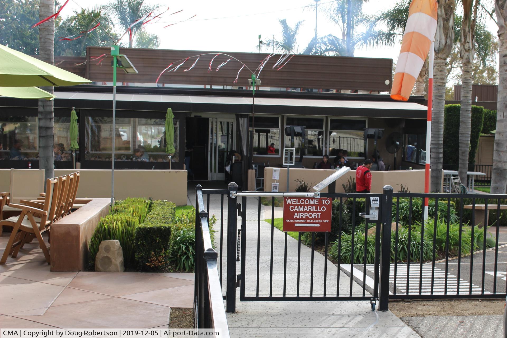 Camarillo Airport (CMA) - Locked entrance to clever CMA Airport Park and superior restaurant, eat indoors or out. Remember your gate code to get back to your aircraft on the transient Ramp. 