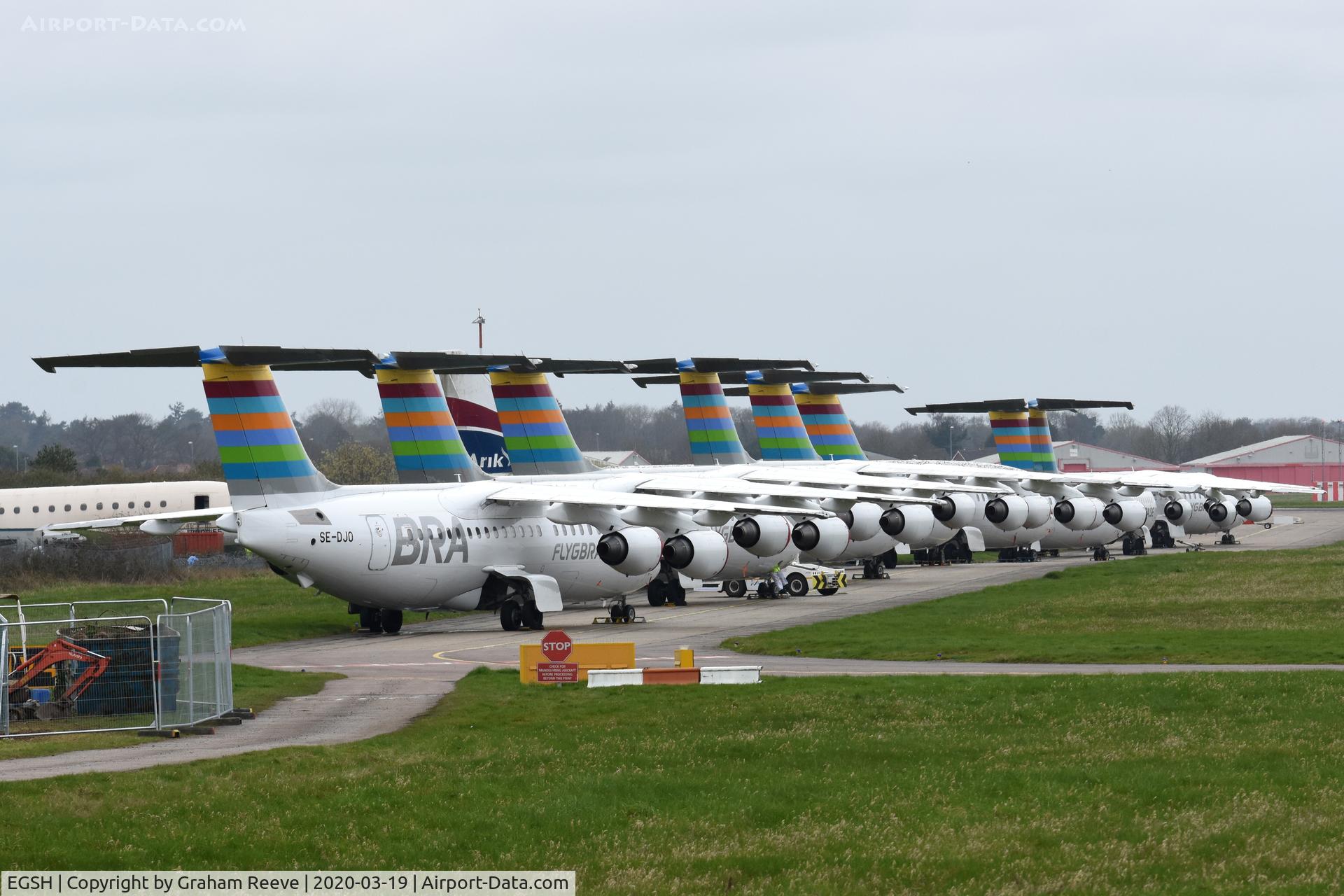 Norwich International Airport, Norwich, England United Kingdom (EGSH) - Line up of Bra.com RJ's at Norwich. SE,-DJN, DSV, DSU, RJI, DSR, DSS, DSV and at the back DJO.