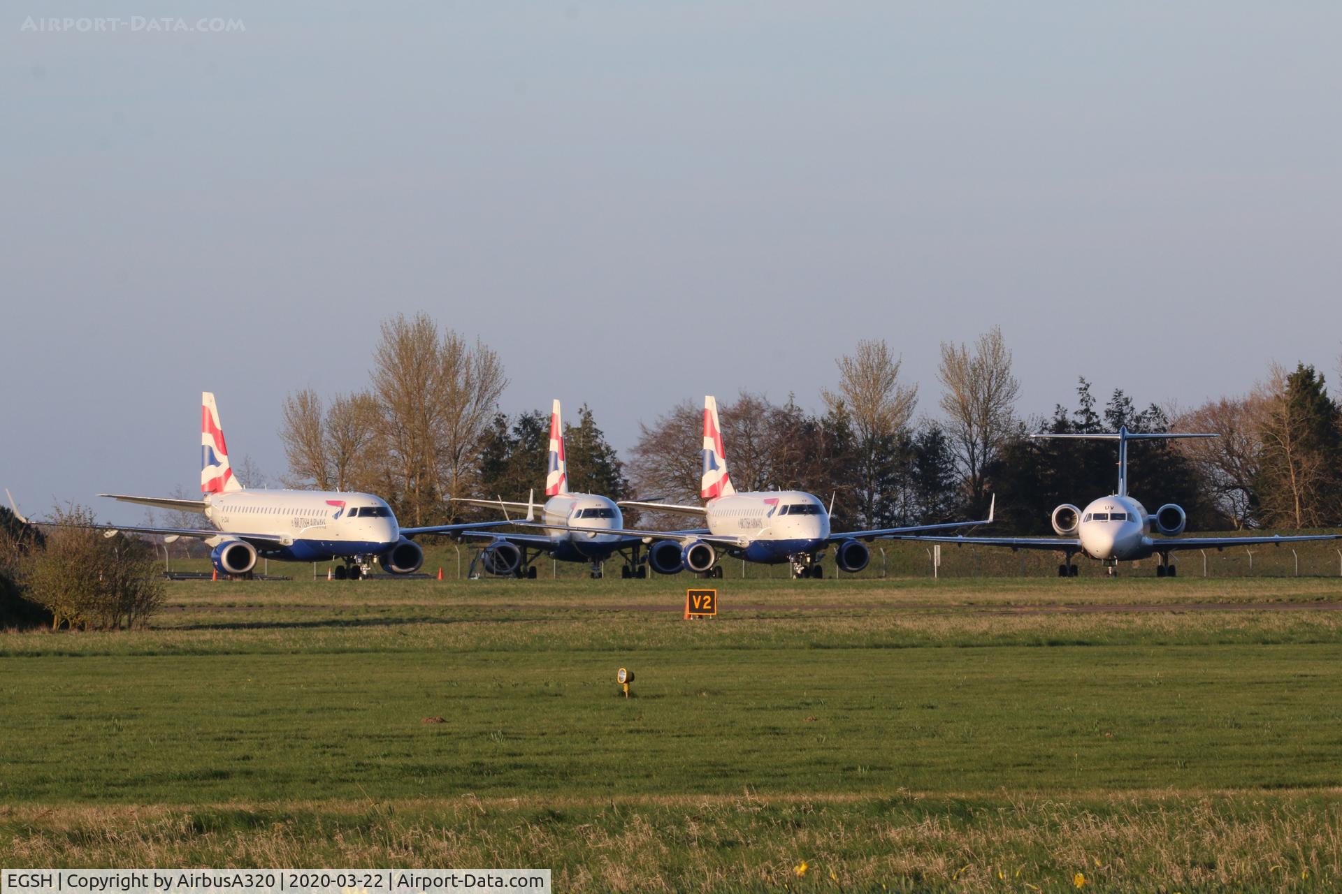 Norwich International Airport, Norwich, England United Kingdom (EGSH) - North West corner of the airfield has become a temp storing area during these hard timesBritish Airways Embraers G-LCAA, G-LCAB, G-LCYF share with old girl Fokker 70 VH0NUV