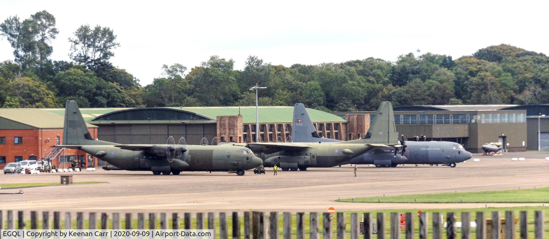 RAF Leuchars Airport, Leuchars, Scotland United Kingdom (EGQL) - Lineup of 2x No. 47 Squadron - Lockheed Martin Hercules C.4 and 1x Danish Air Force Lockheed Martin C-130J-30 Super Hercules