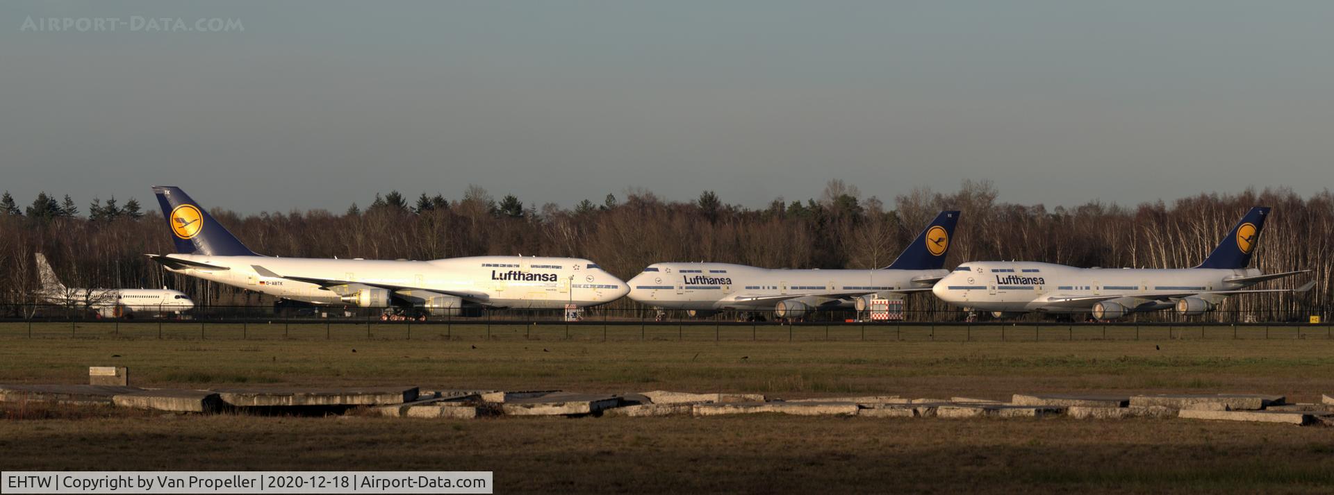 Enschede Airport Twente, Enschede Netherlands (EHTW) - Three Lufthansa Boeing 747-430s, D-ABTK + D-ABVX + D-ABTL, stored at Twente airport due to the Covid-19 pandemic