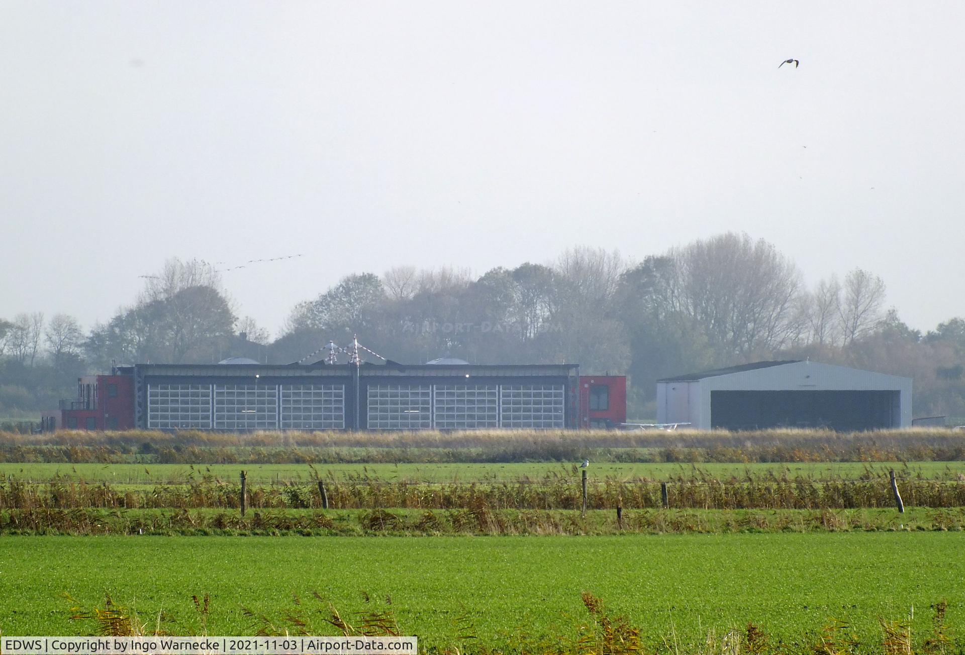 EDWS Airport - Norden-Norddeich airfield hangars seen from a distance
