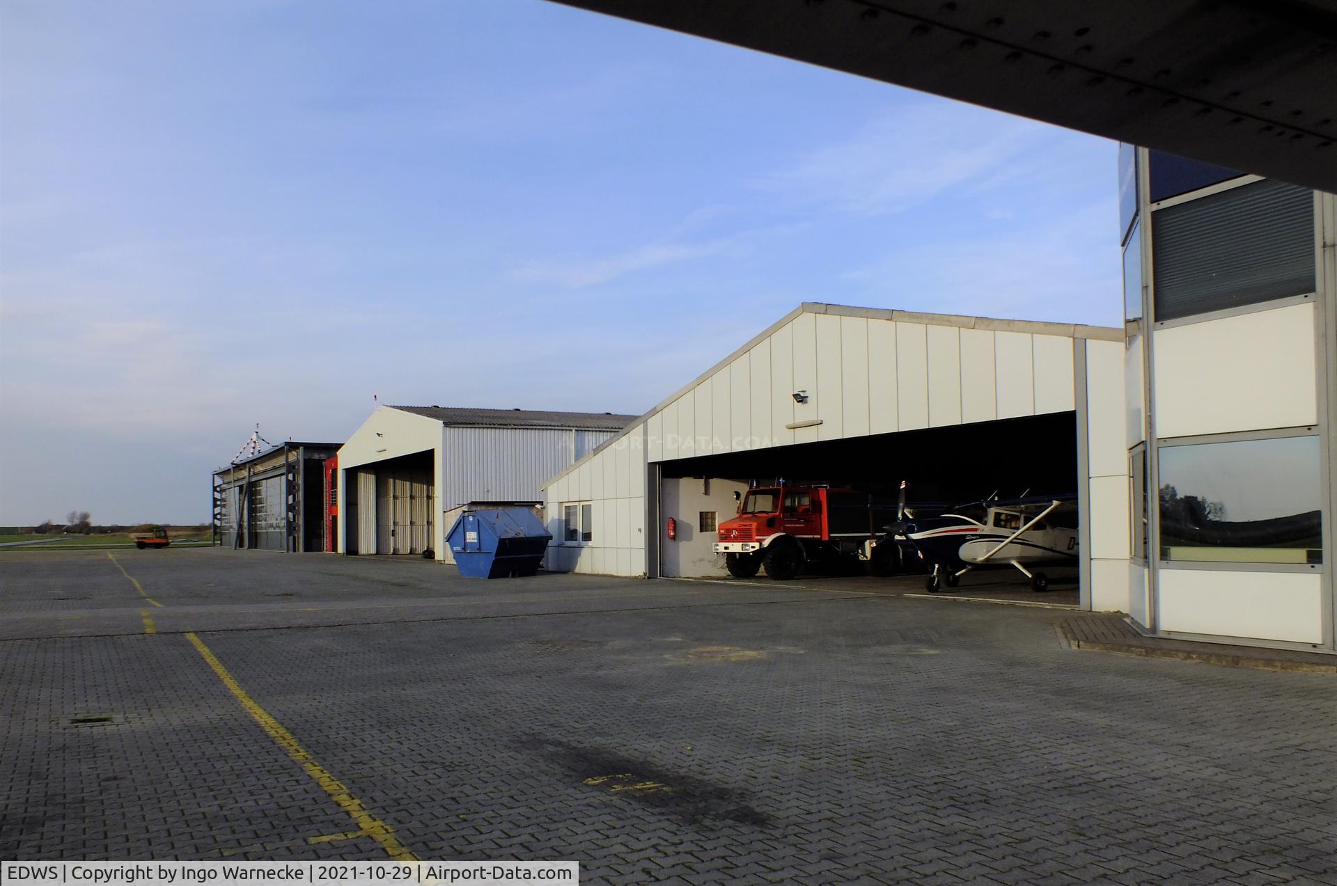 EDWS Airport - airside view of apron and hangars at Norden-Norddeich airfield