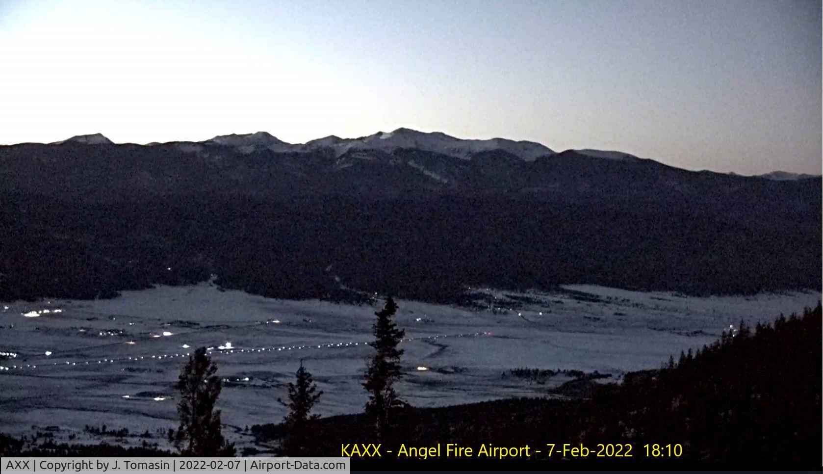 Angel Fire Airport (AXX) - Angel Fire Airport taken from webcam at Ski Area summit. Feb-2022 at dusk, runway lights at max intensity. 