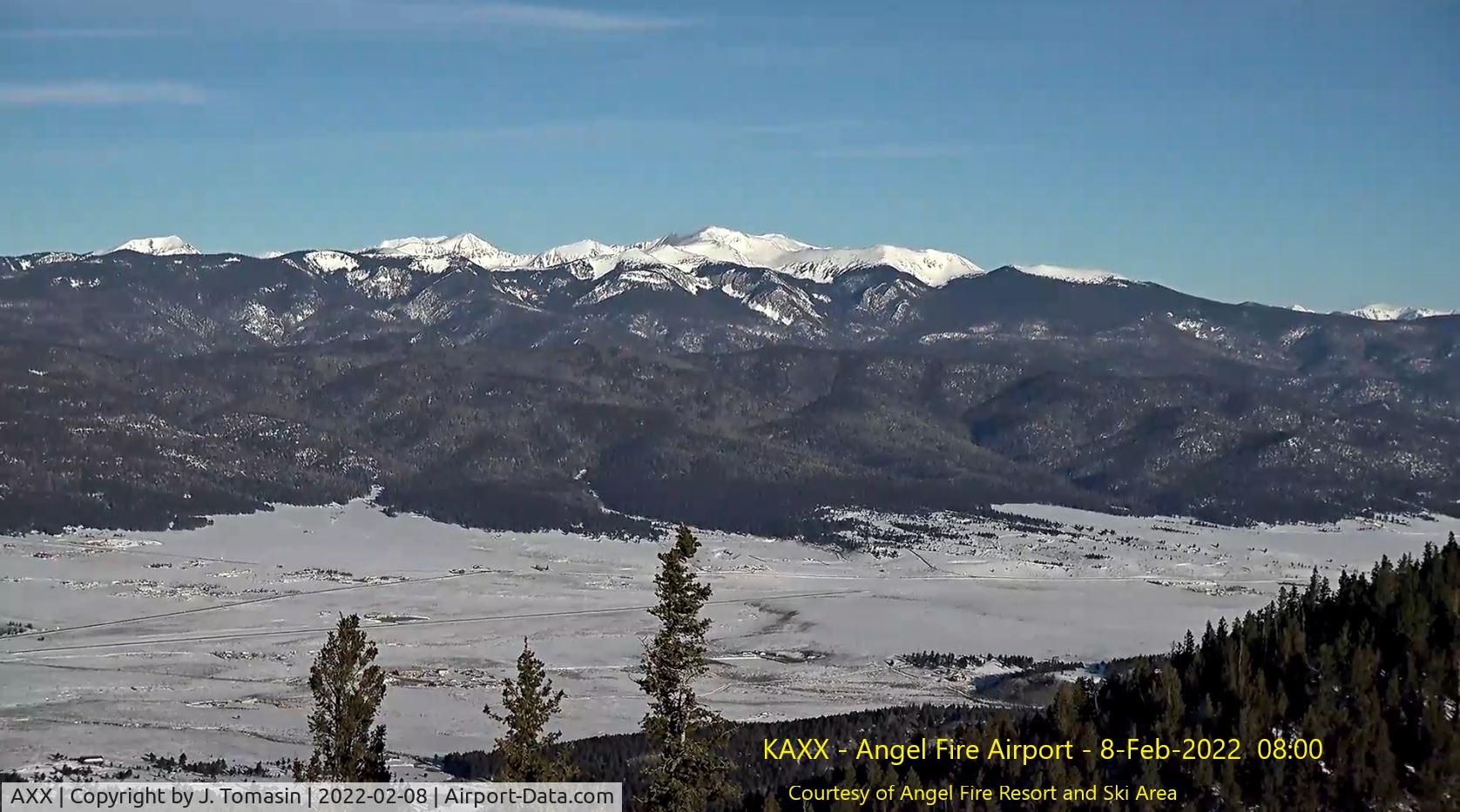 Angel Fire Airport (AXX) - Angel Fire Airport taken from webcam at Angel Fire Ski Area summit. Feb-2022. Looking northwest towards Wheeler Peak. Webcam courtesy of Angel Fire Resort.