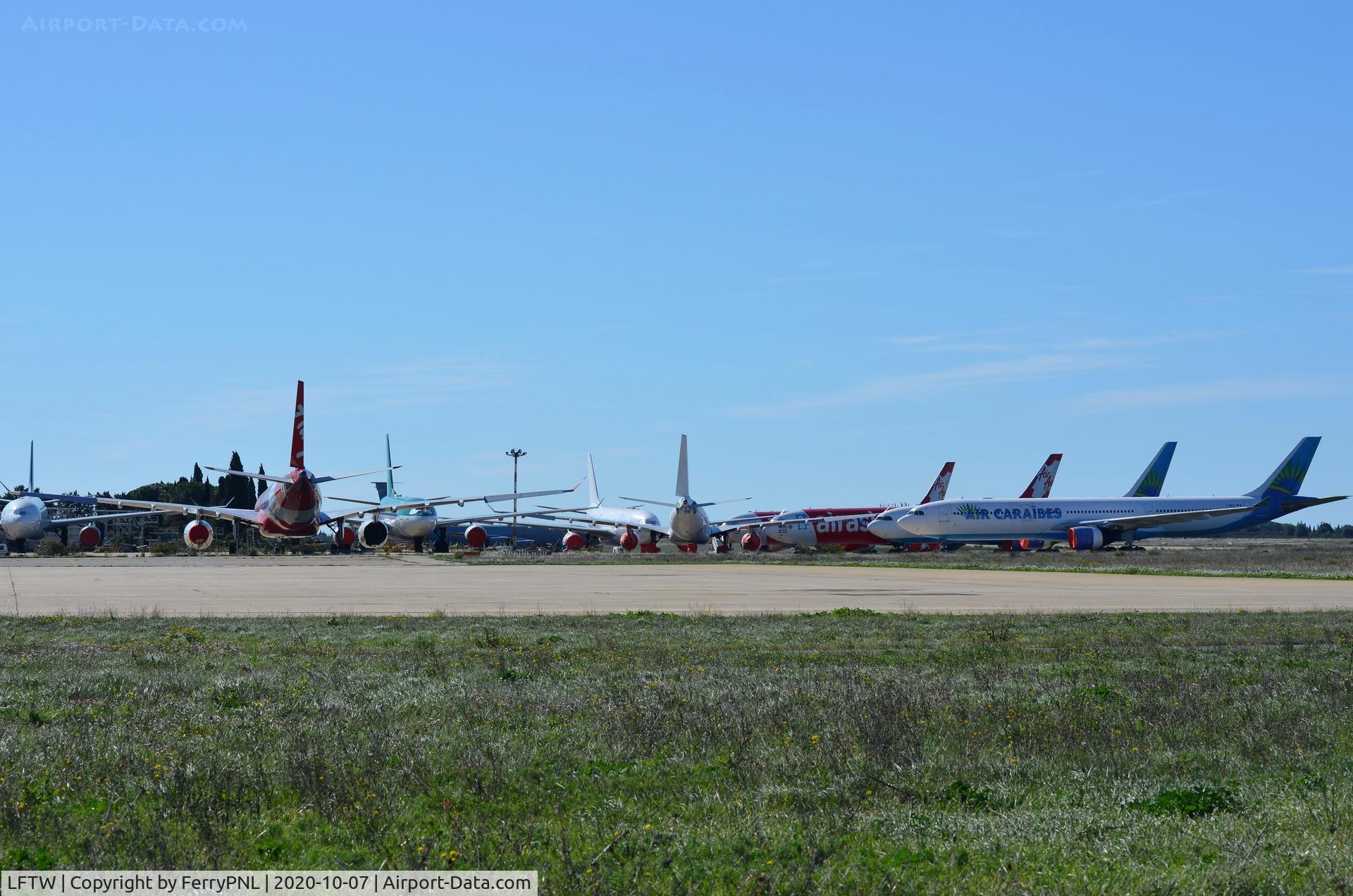 Nîmes-Arles-Camargue Airport, Nîmes France (LFTW) - Nimes apron (West) overview with a number of A330's parked up