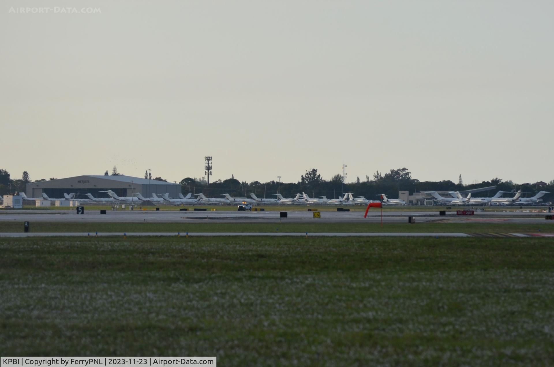 Palm Beach International Airport (PBI) - View towards the Netjets area in PBI with over 35+ planes visible