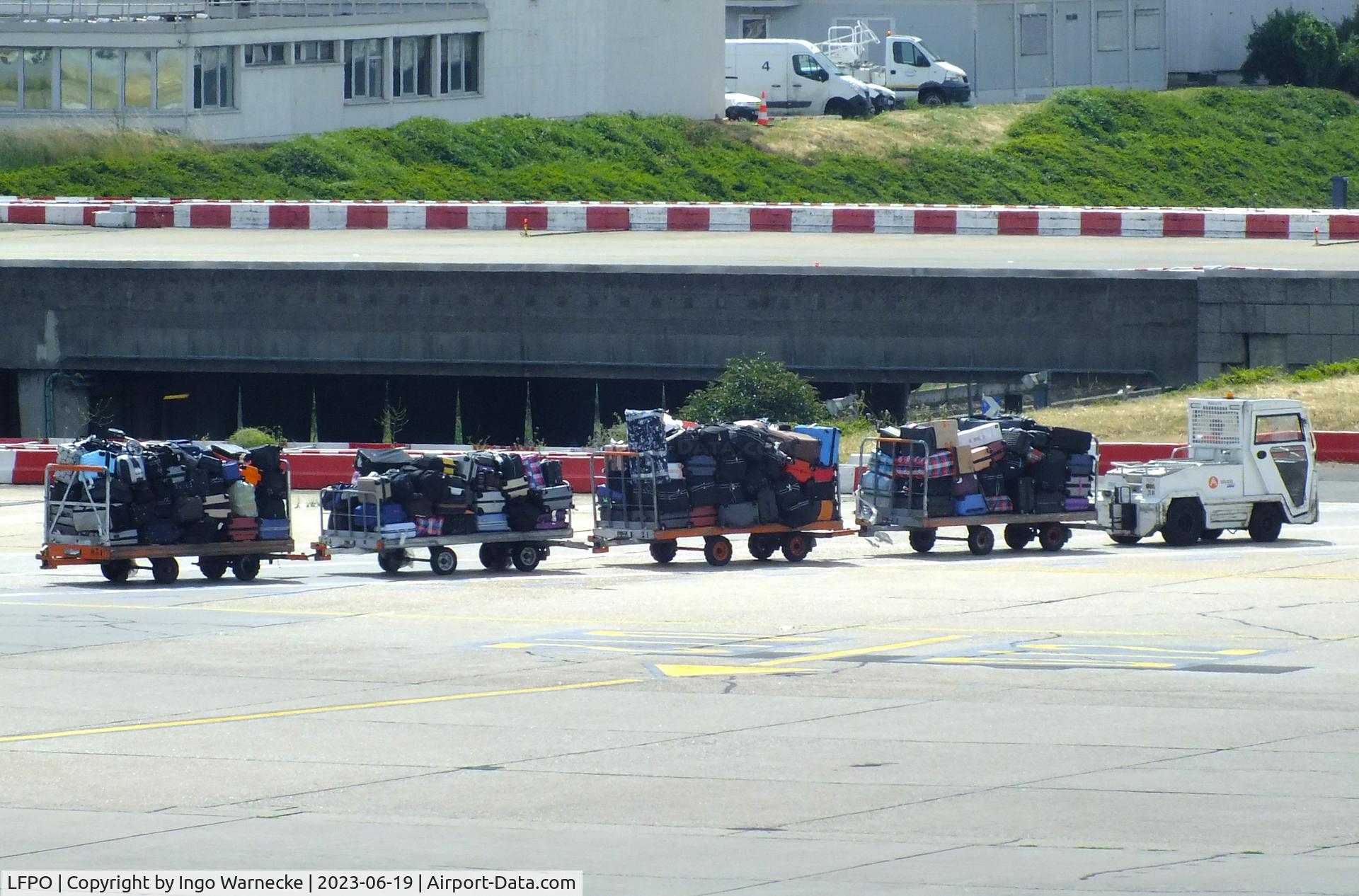 Paris Orly Airport, Orly (near Paris) France (LFPO) - outgoing baggage train at Paris/Orly airport #v