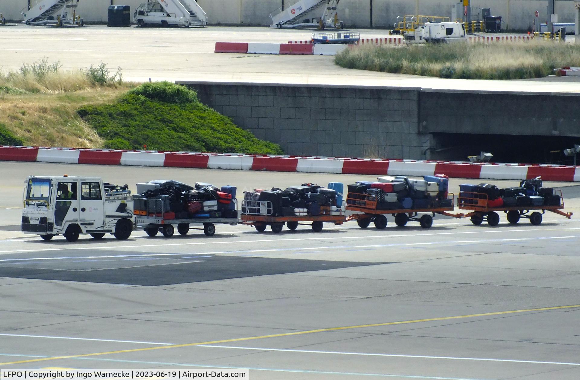 Paris Orly Airport, Orly (near Paris) France (LFPO) - incoming baggage train at Paris/Orly airport #v