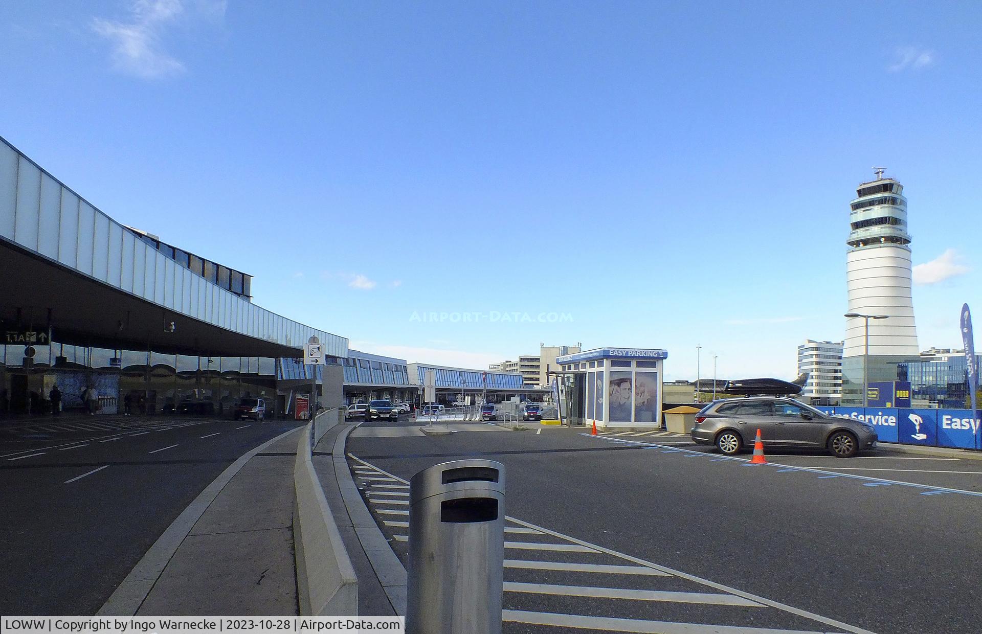 Vienna International Airport, Vienna Austria (LOWW) - streetside view of terminals and tower at Wien airport