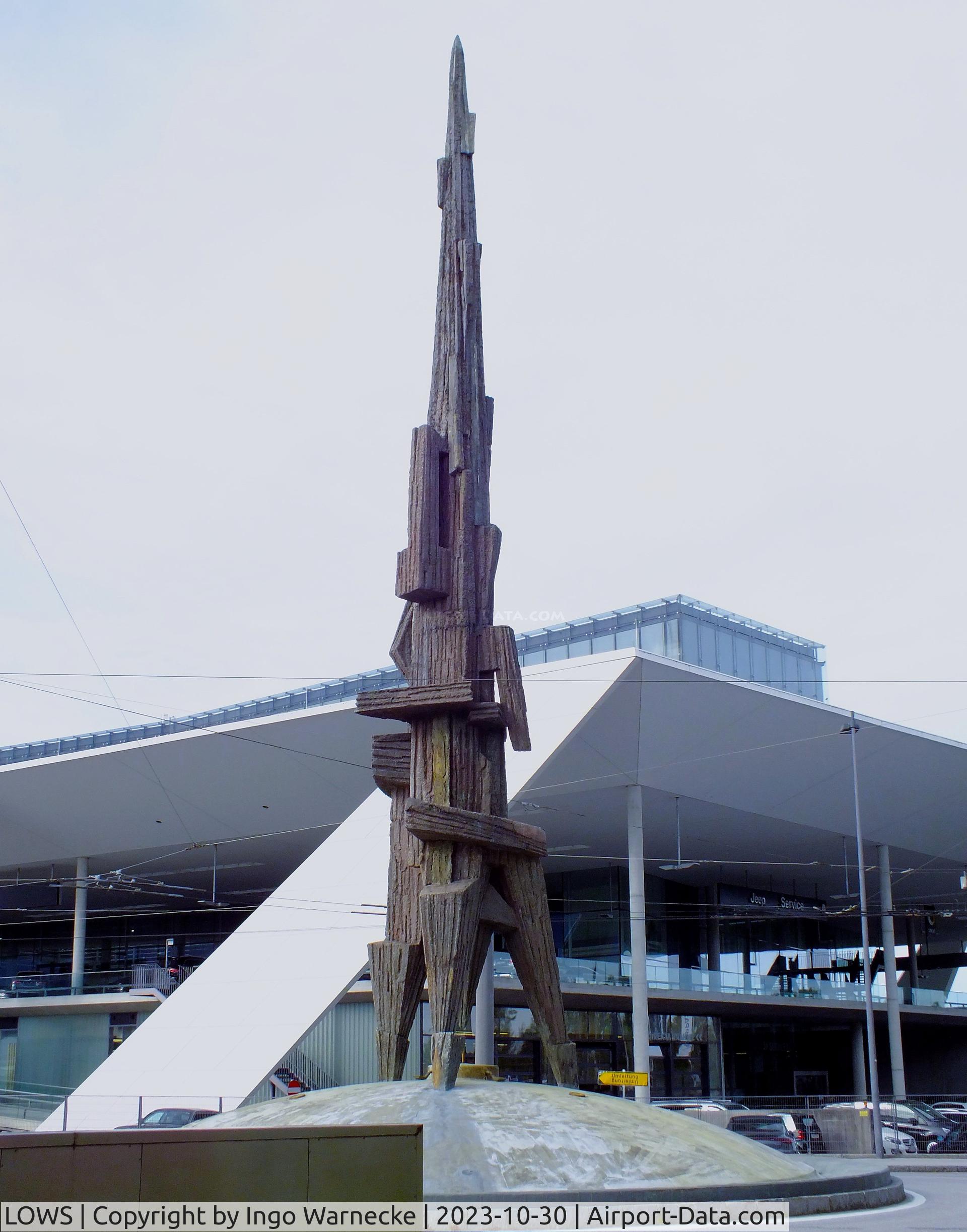 Salzburg Airport, Salzburg Austria (LOWS) - sculpture 'Start' by J.Magnus in front of the multi-storey car park at Salzburg airport