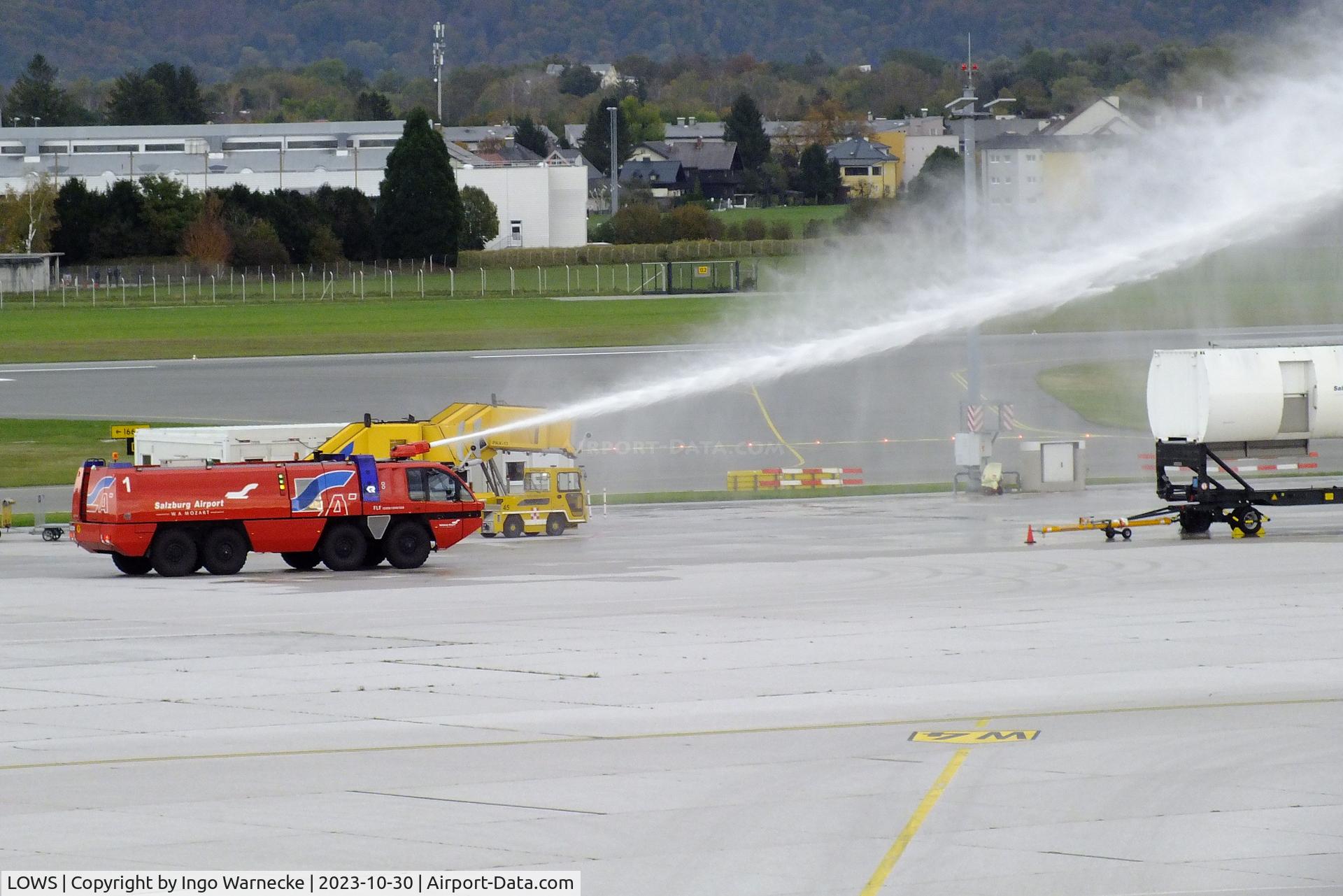 Salzburg Airport, Salzburg Austria (LOWS) - airport fire truck exercising with training trailer at Salzburg airport #v