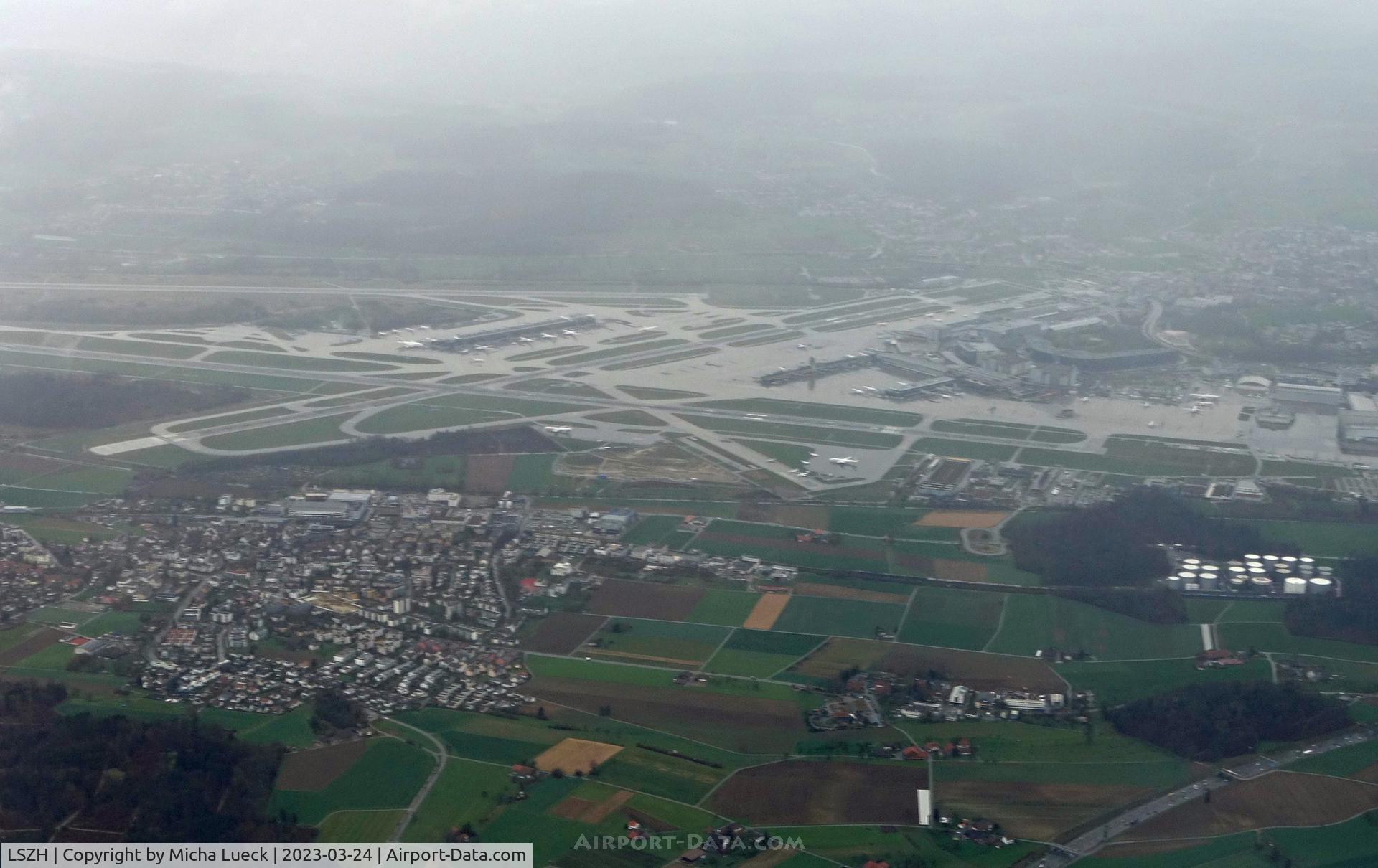 Zurich International Airport, Zurich Switzerland (LSZH) - Leaving Zurich on a wet and dark day (ZRH-ARN on HB-IJK)