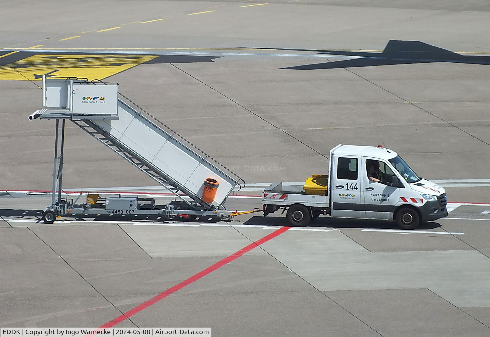 Cologne Bonn Airport, Cologne/Bonn Germany (EDDK) - open boarding stairs being towed at Köln/Bonn airport #v