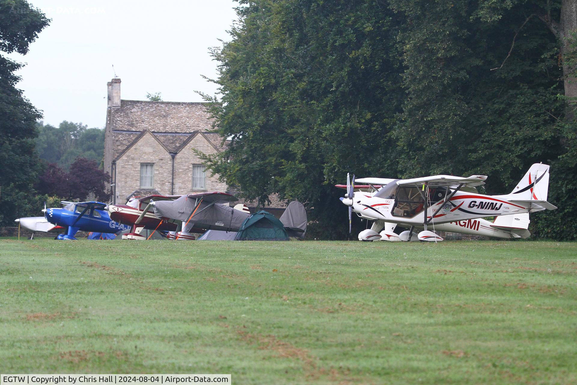 Oaksey Park Airport, Oaksey, England United Kingdom (EGTW) - Luscombe fly in