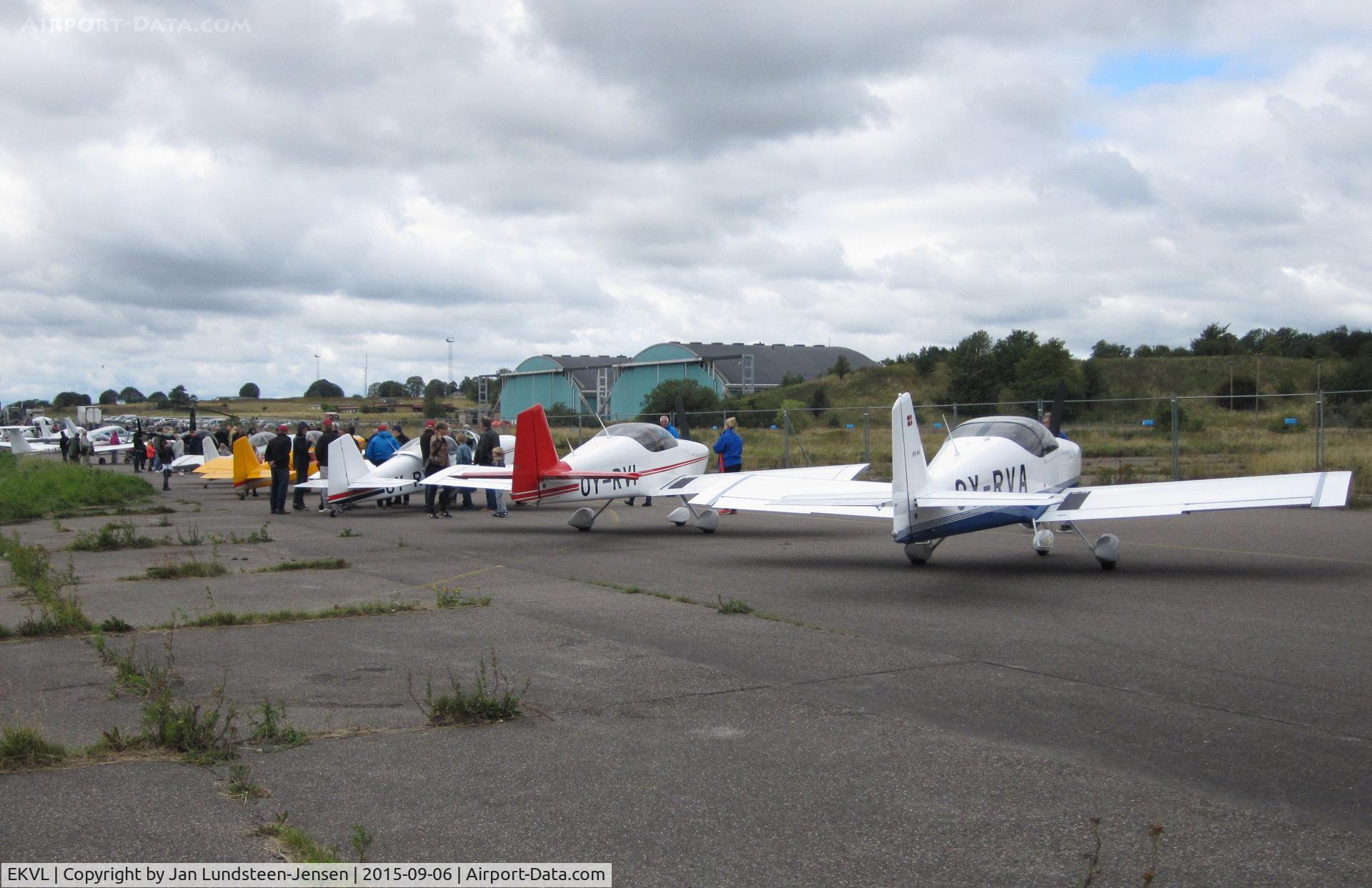EKVL Airport - An airshow at the former Vaerloese Air Base in Denmark. To the right Van's RV-6A OY-RVA. This aircraft was damaged beyond repair in a forced landing on water in 2023. Pilot OK.