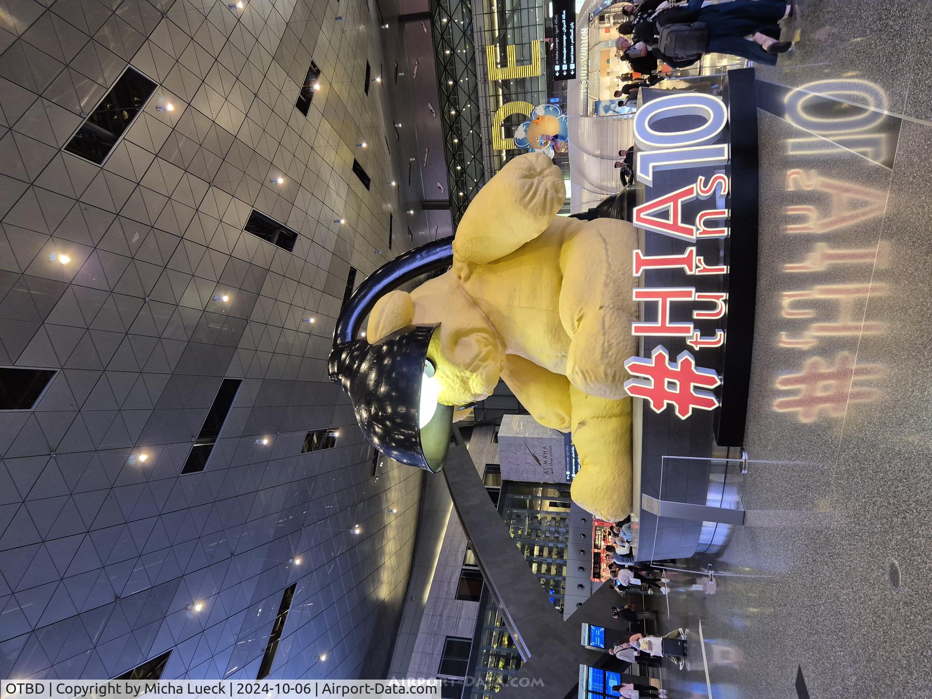 Doha International Airport, Doha Qatar (OTBD) - You can't miss the iconic huge teddy bear at Doha