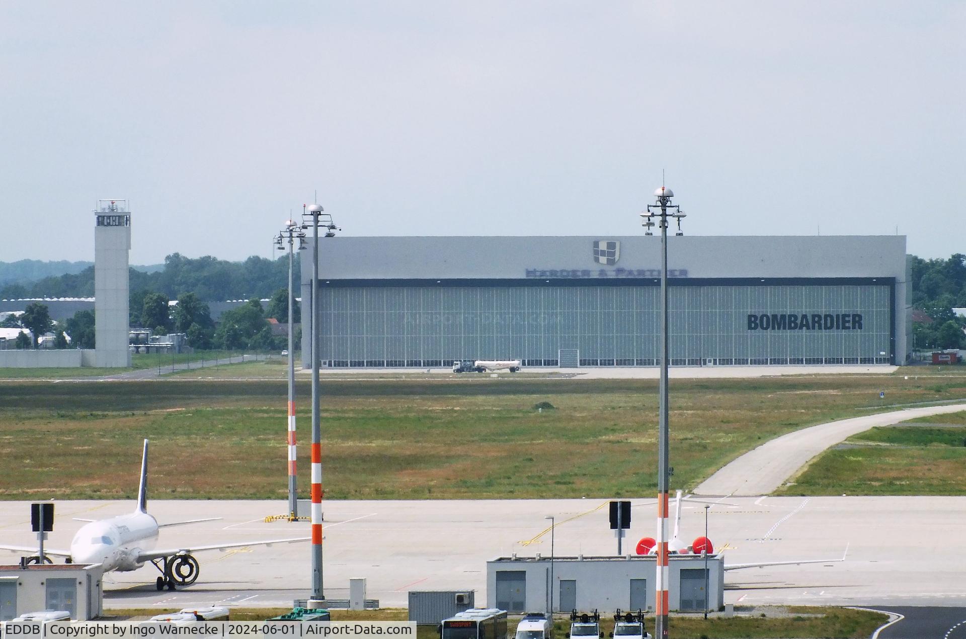 Berlin Brandenburg International Airport, Berlin Germany (EDDB) - Bombardier hangar and radar tower at BER airport