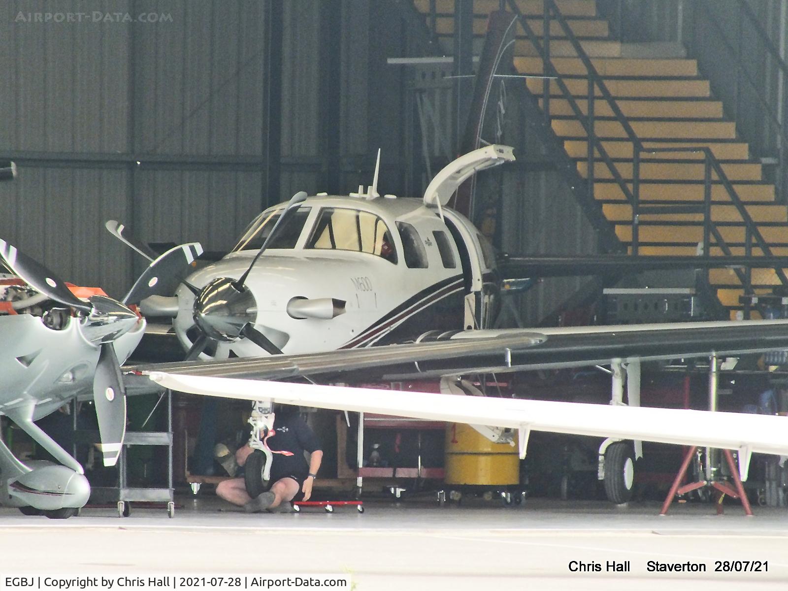 Gloucestershire Airport, Staverton, England United Kingdom (EGBJ) - Piper PA-46-600TP M600 in a hangar at Staverton
